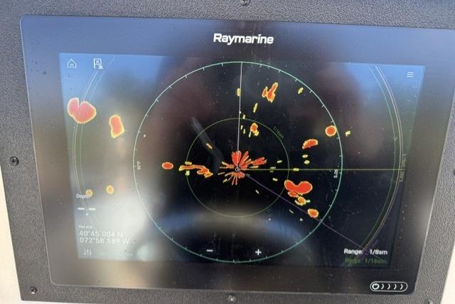 Raymarine radar display on 2006 Sailfish 2660 CC boat showing navigation data.