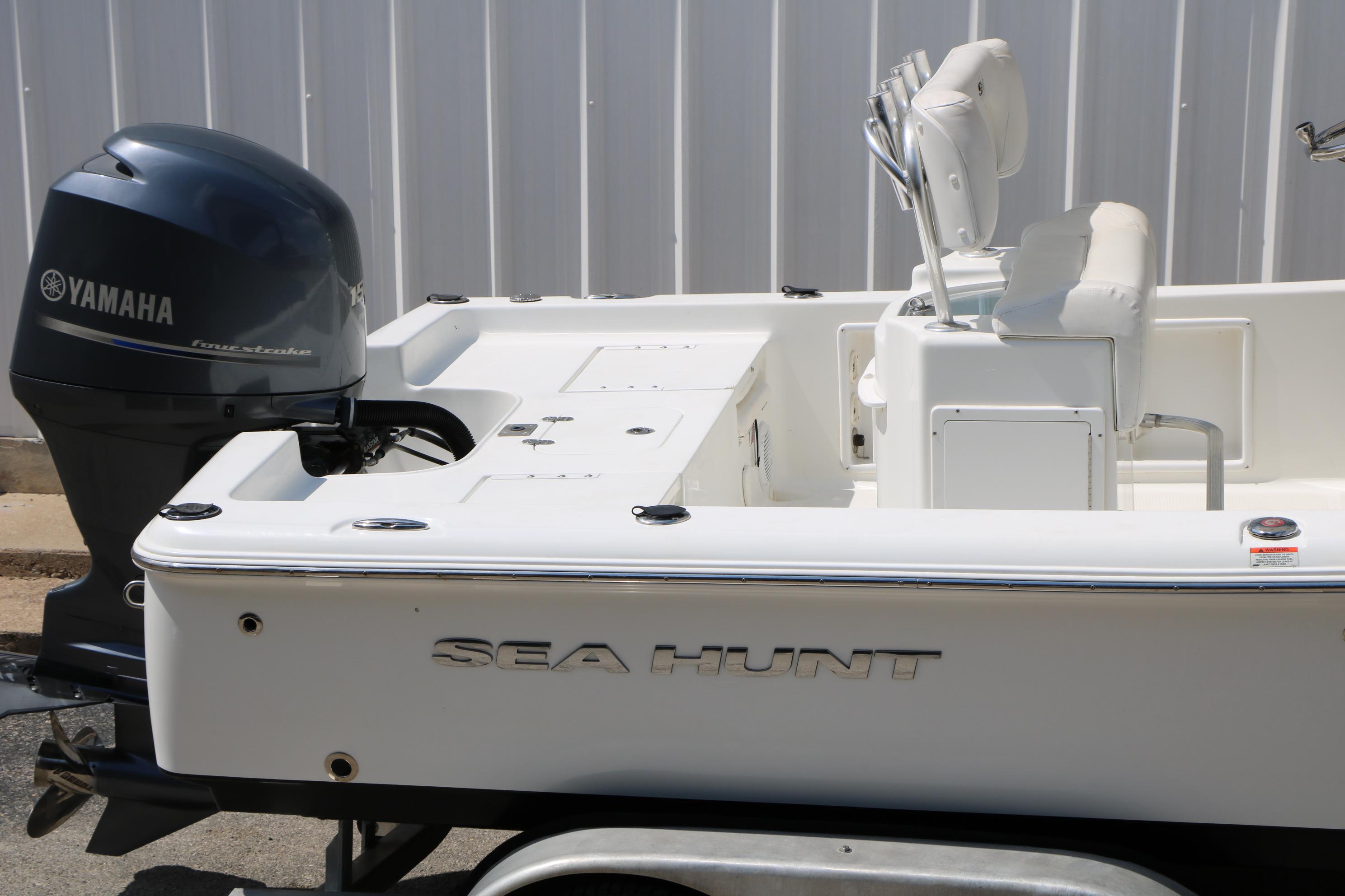 2015 Sea Hunt BX 22 BR boat with Yamaha outboard motor, side view.