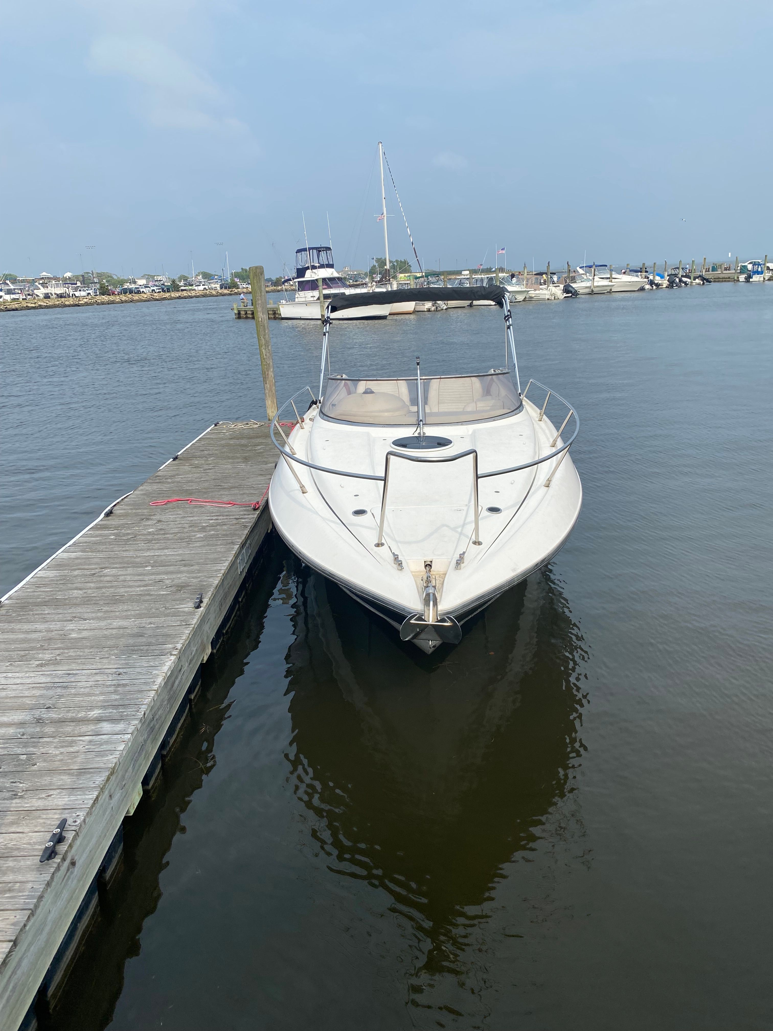 1994 Sunseeker Hawk 31 docked at a marina.