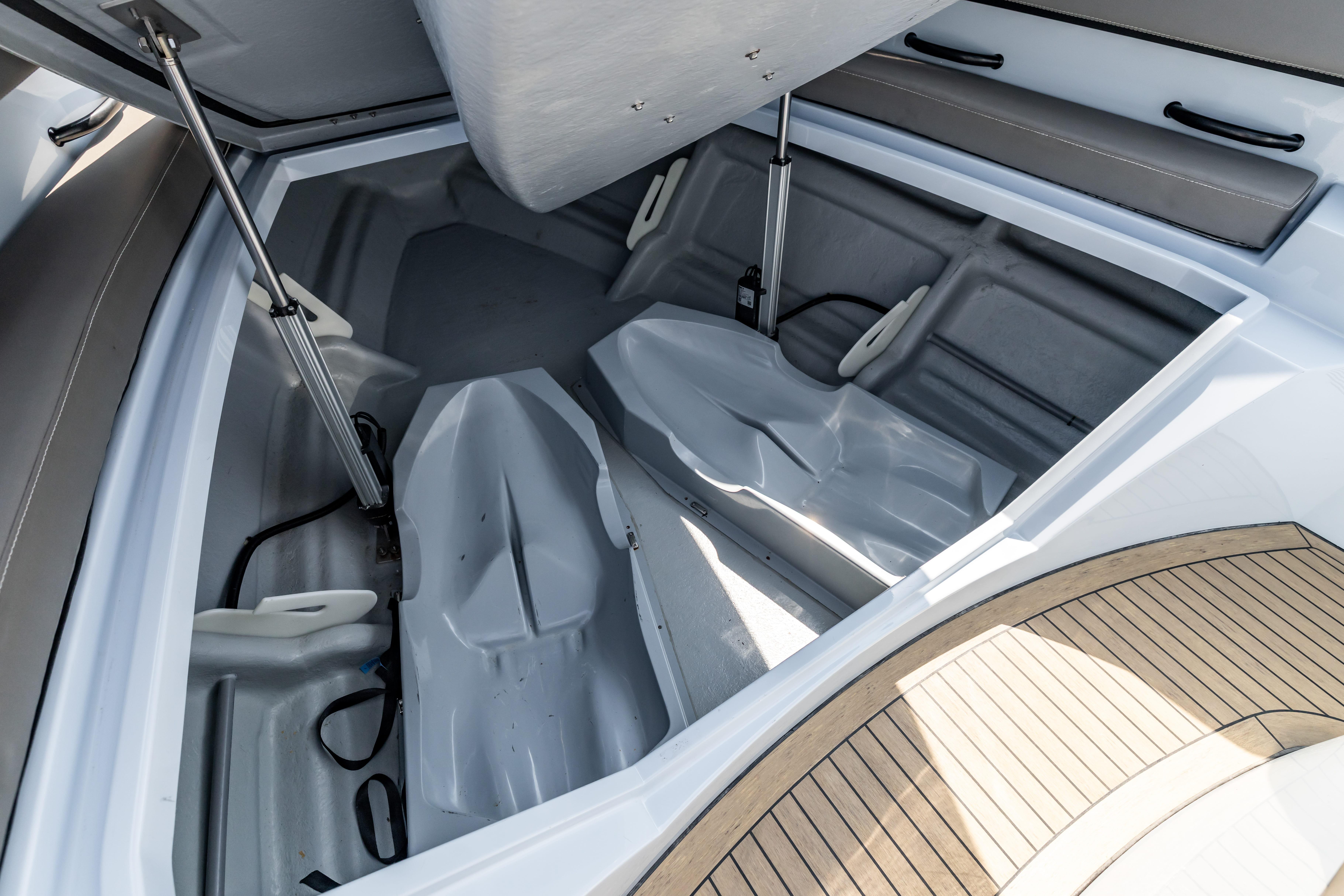 Interior storage compartment of a 2017 Wajer 38 boat, featuring sleek design and ample space.