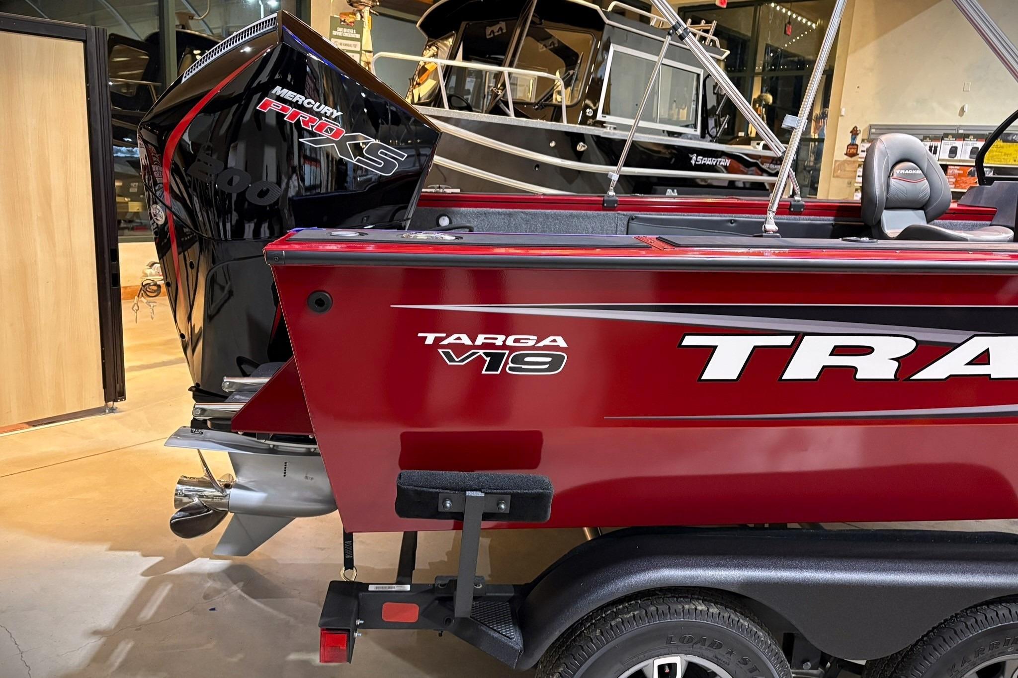 2025 Tracker Targa V-19 WT boat with Mercury Pro XS engine, red exterior.