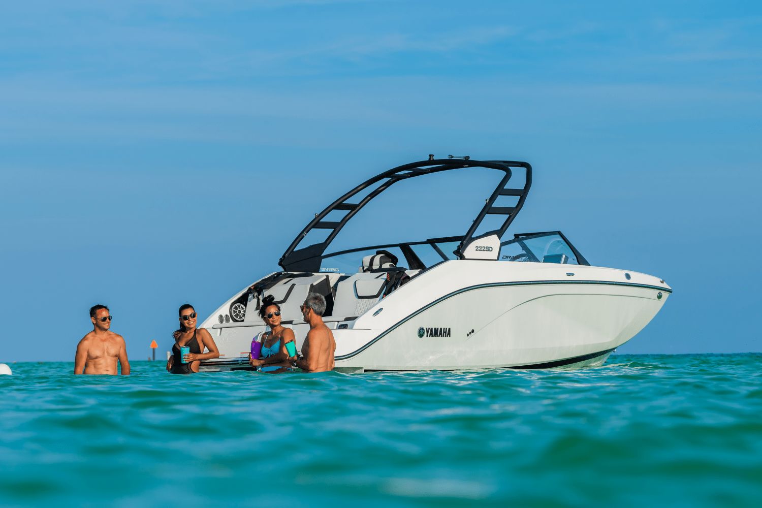 Yamaha 222SD from 2026 on the water with people on board.