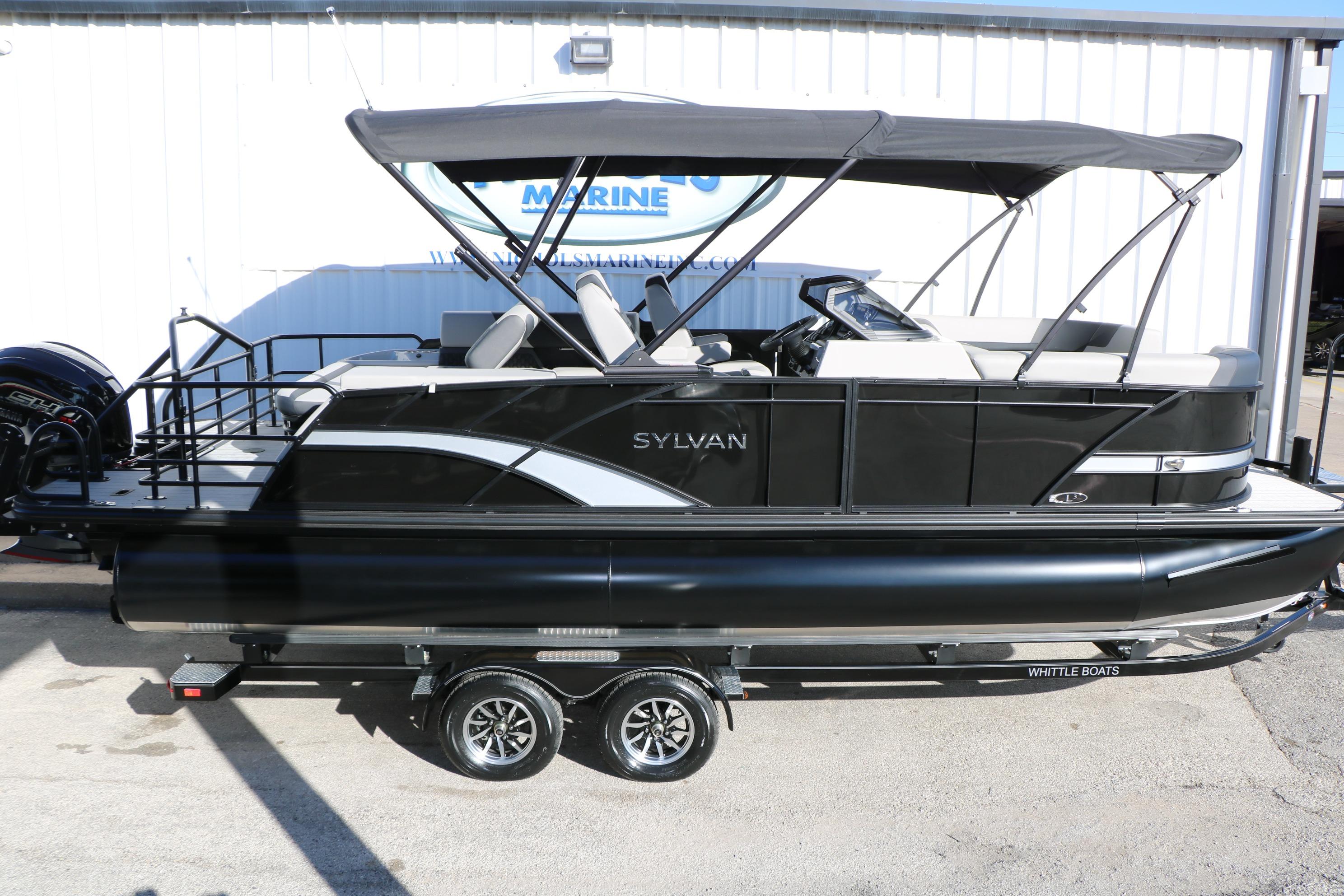 2026 Sylvan L3 CLZ DH pontoon boat with canopy on trailer, side view.
