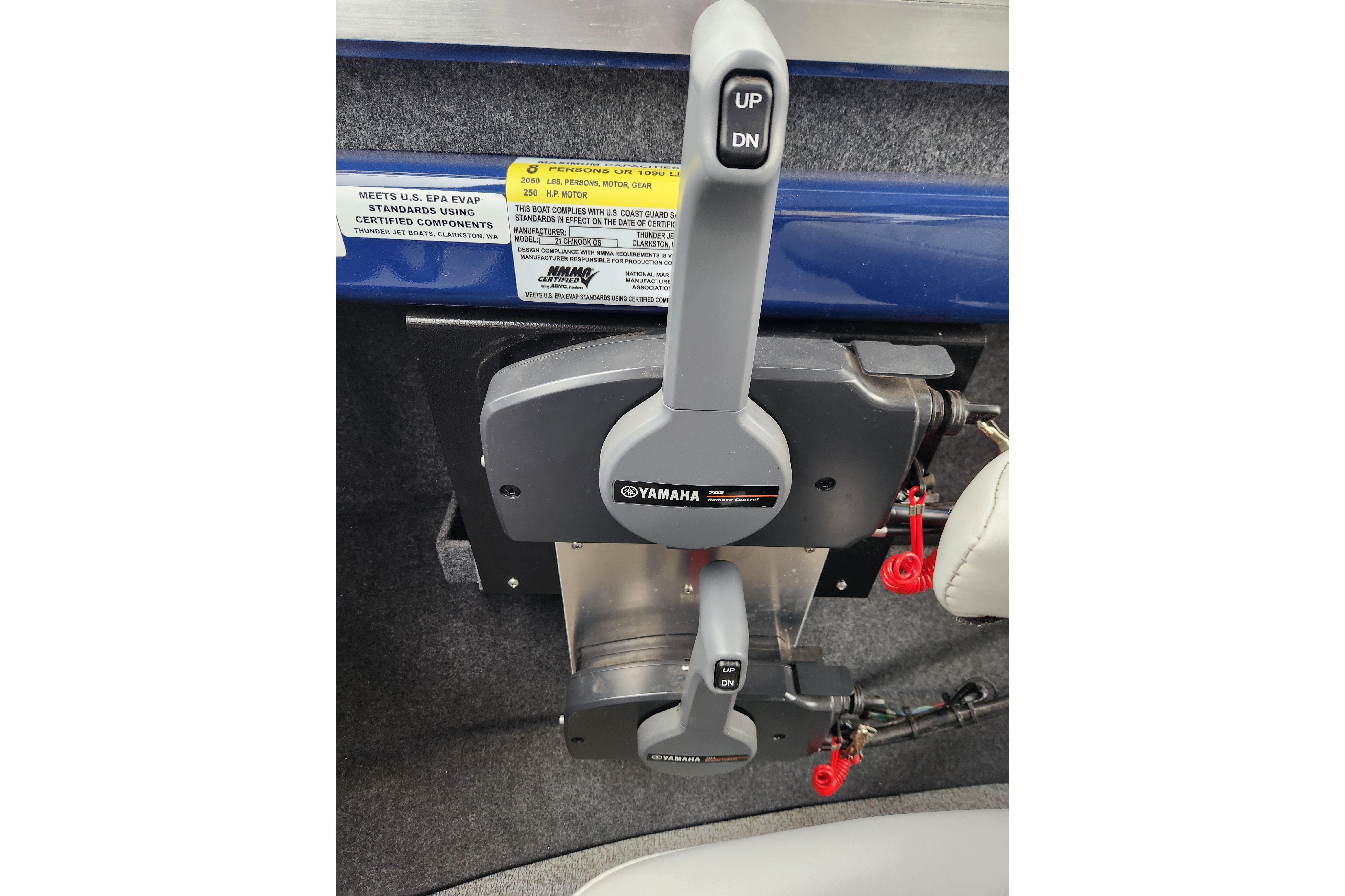 Throttle controls of a 2025 Thunder Jet 21 Chinook OS boat with Yamaha branding.