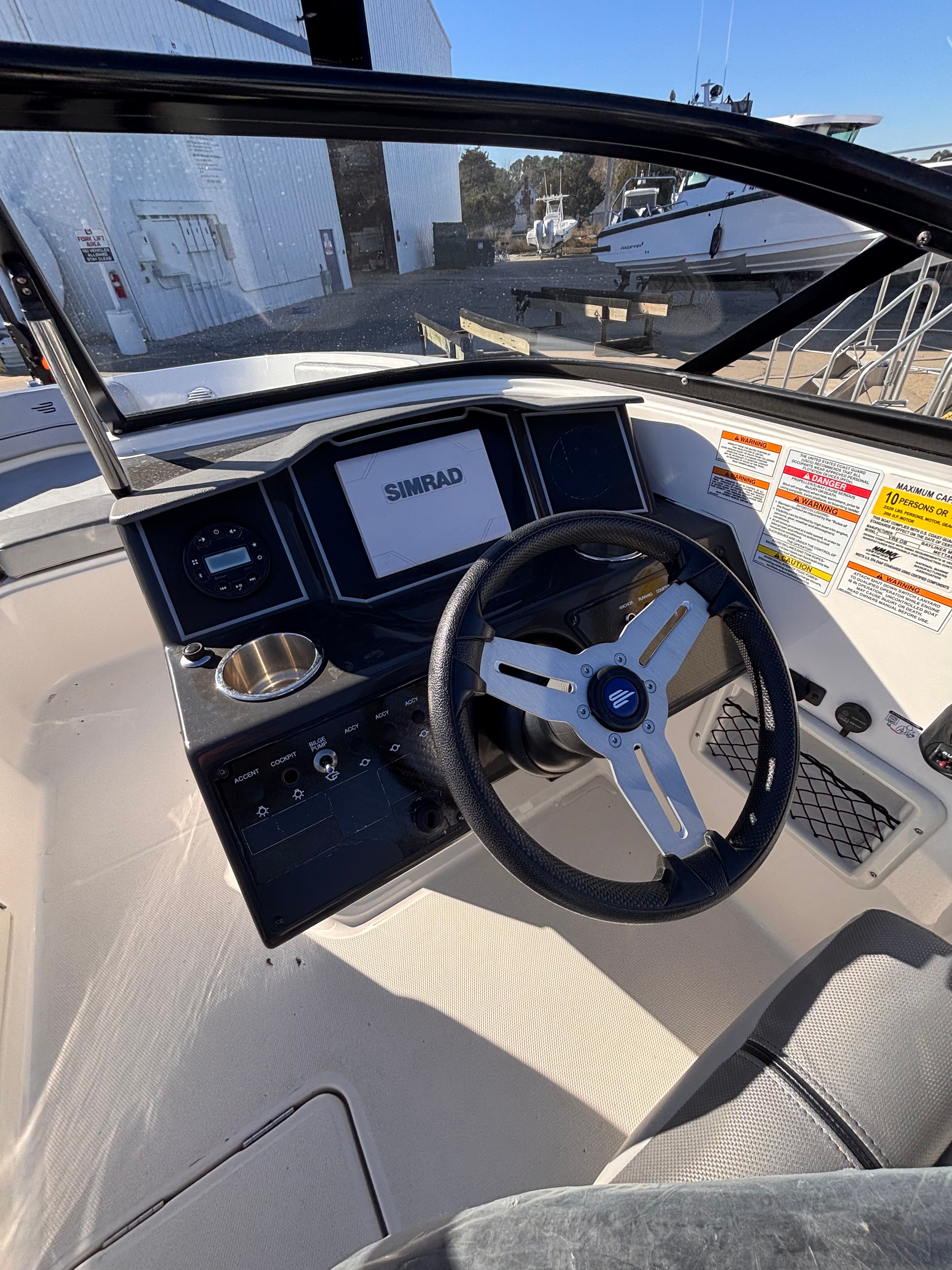 2024 Bayliner VR6 Bowrider OB cockpit with Simrad display.