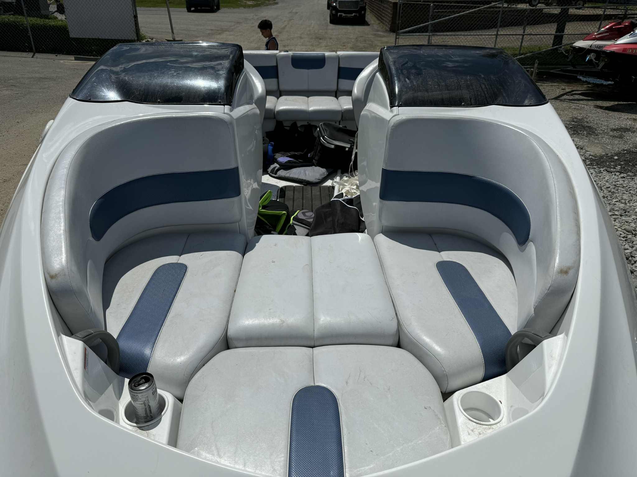 2006 Sea-Doo 180 Challenger boat interior with white and blue seating.