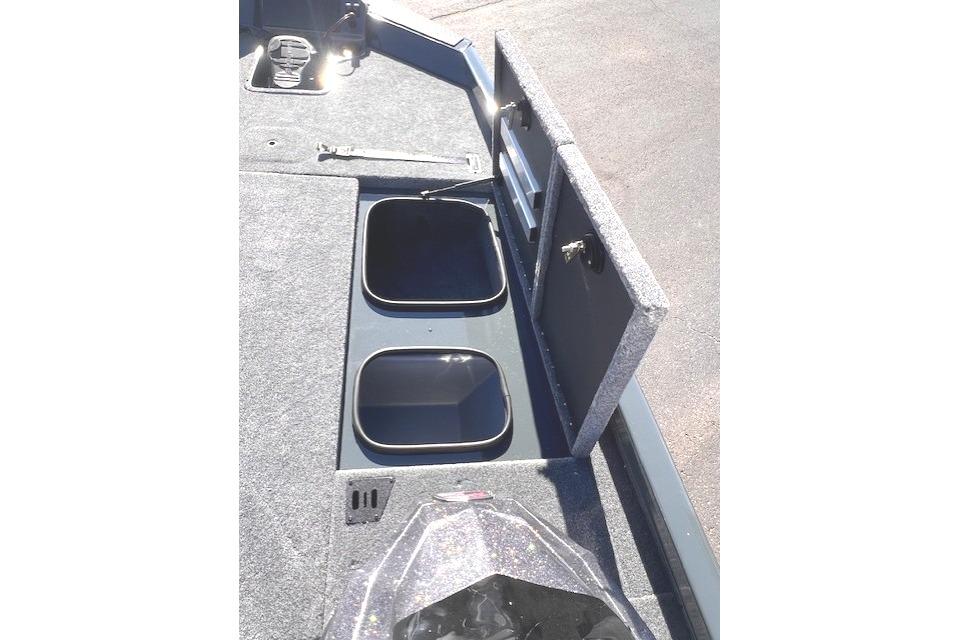 Ranger RT188P 2026 boat with open storage compartment.