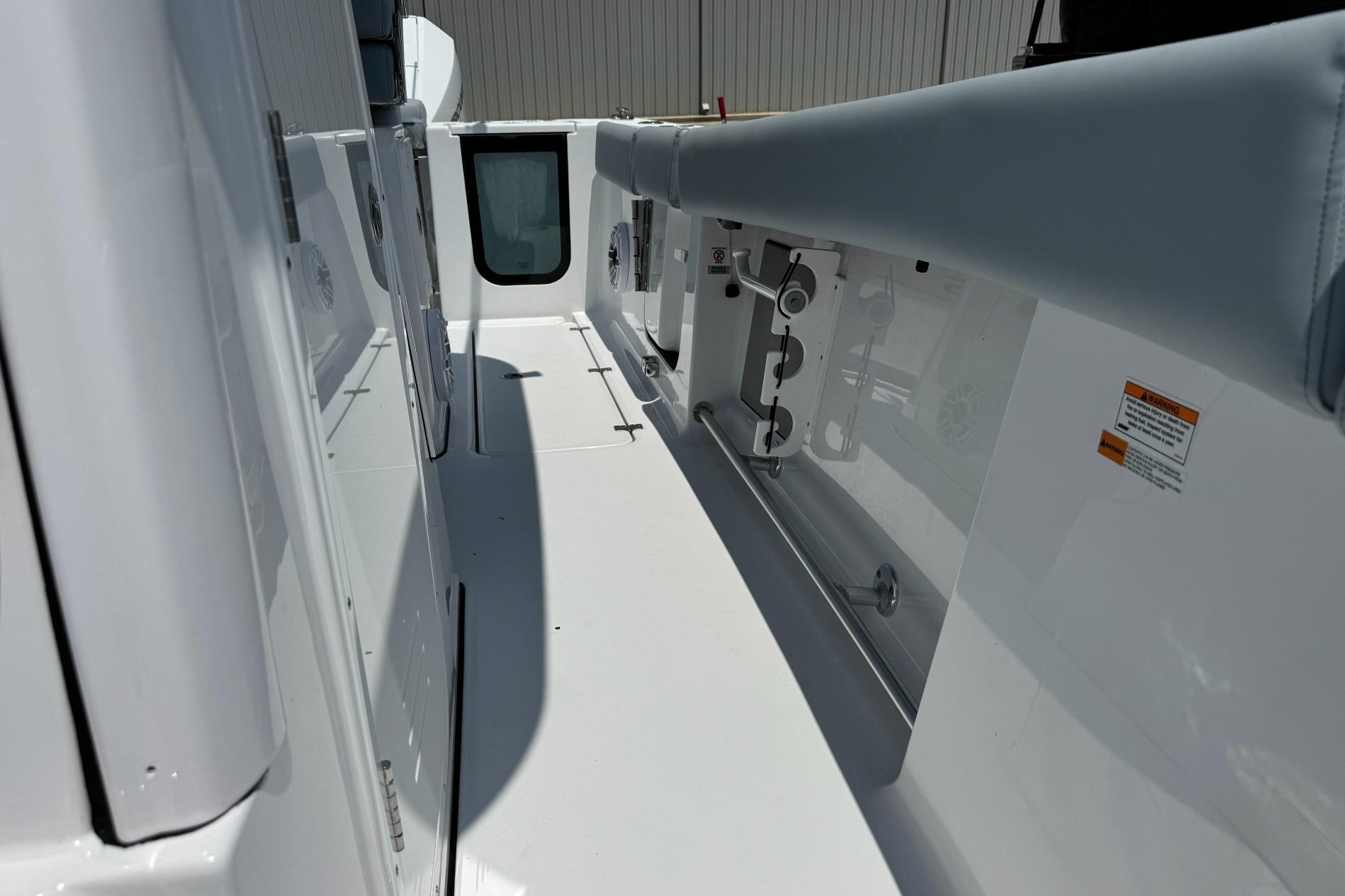 2026 Sportsman Open 262 Center Console boat interior, showcasing sleek white deck and modern fittings.