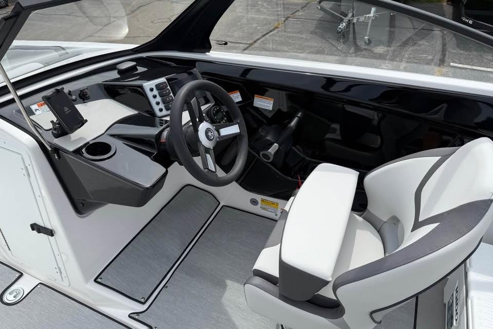 2026 Yamaha Boats AR220 cockpit with modern steering and controls.