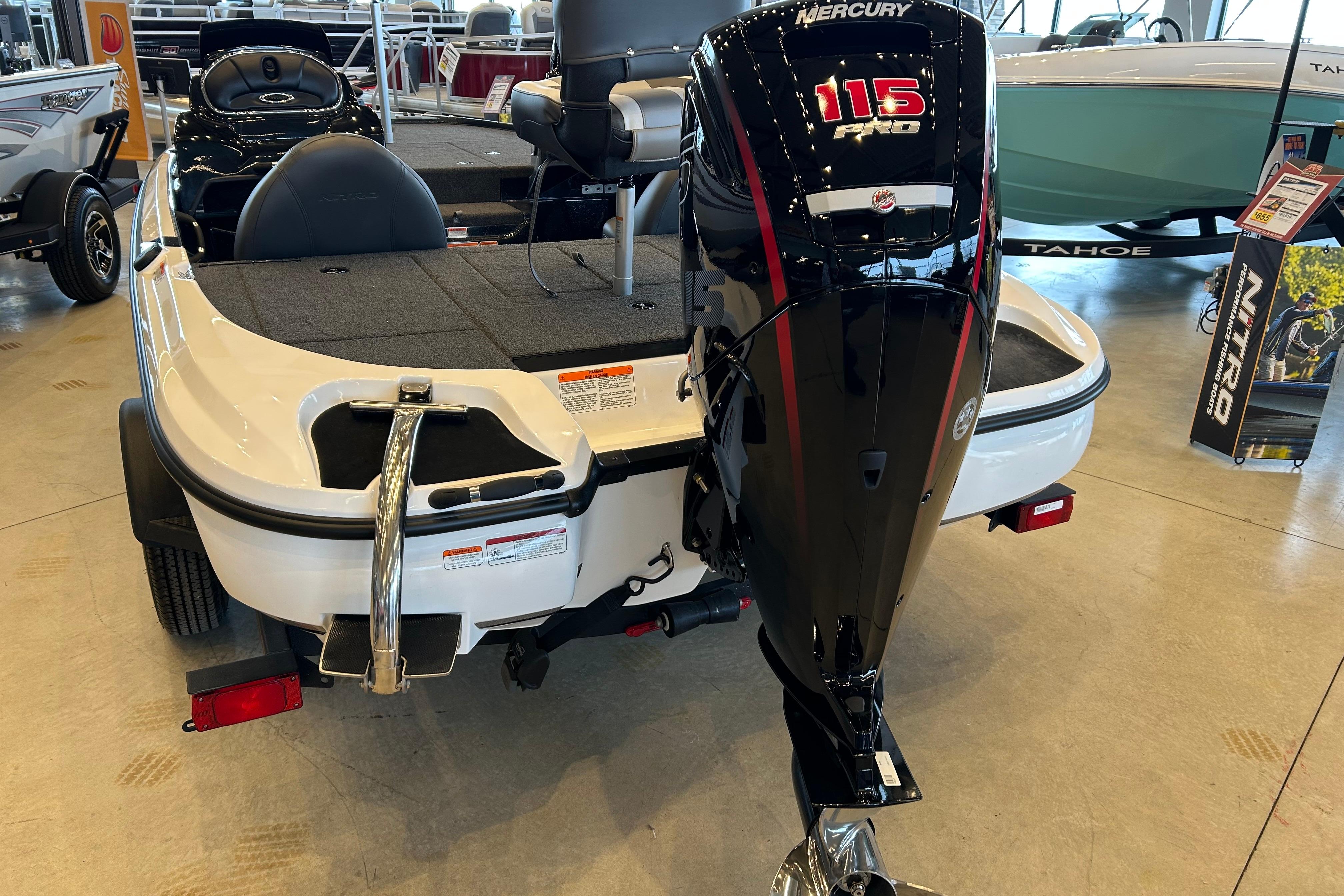 Nitro Z17 2026 boat with Mercury 115 Pro XS engine displayed in showroom.