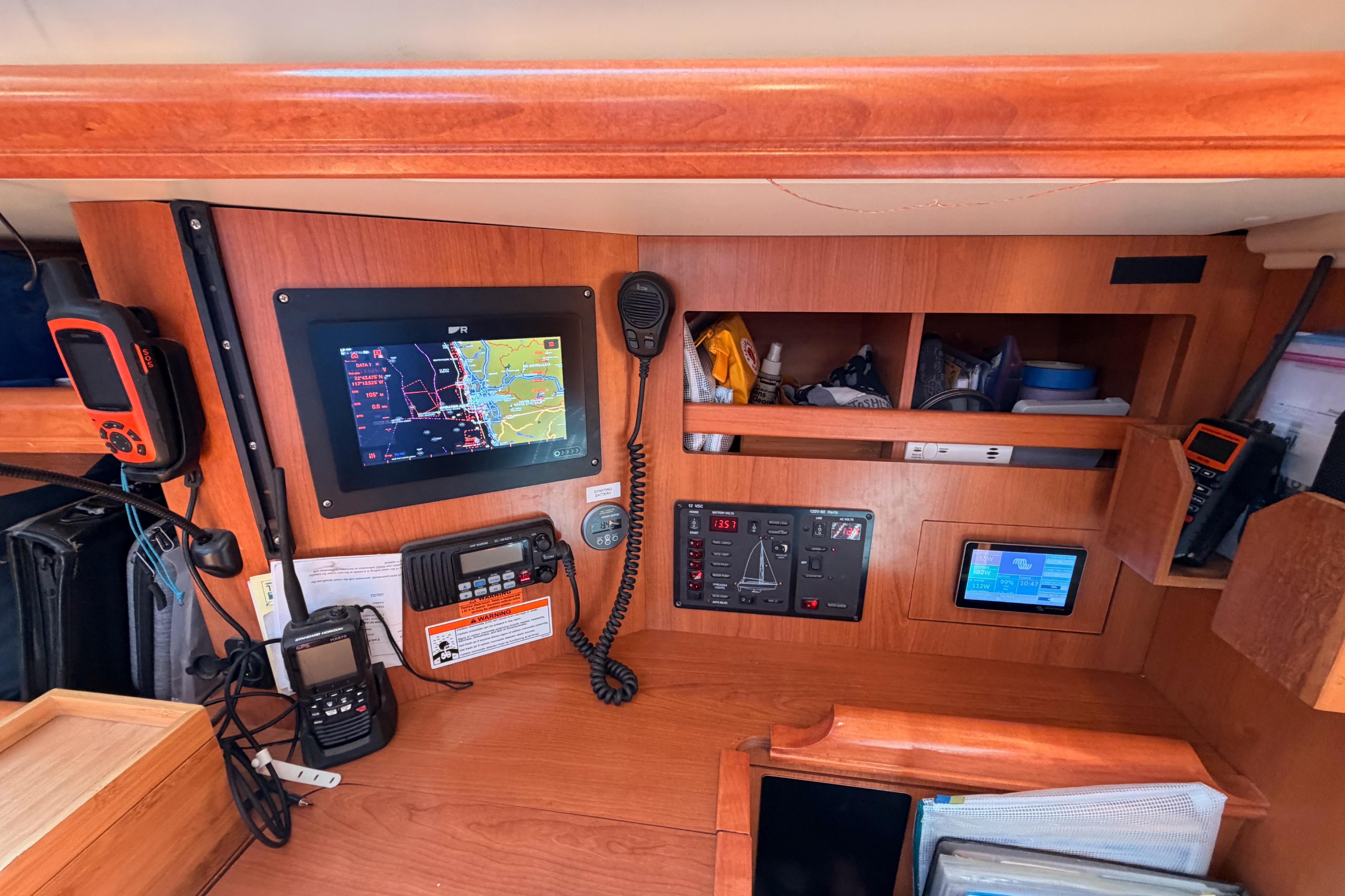 Navigation and communication equipment inside a 2008 Hunter 45 Deck Salon yacht.
