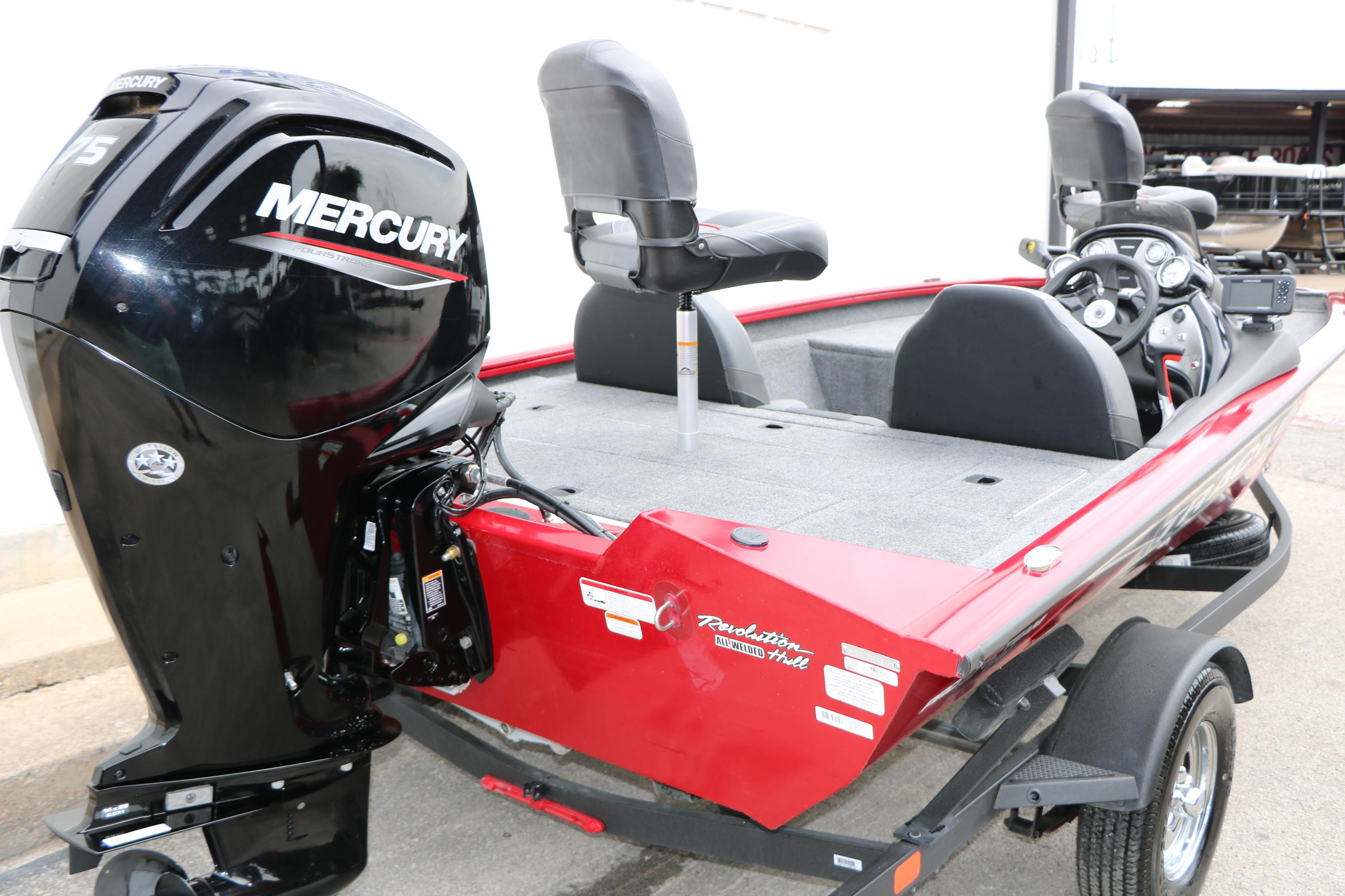 2024 Tracker Pro Team 175 boat with Mercury engine, red exterior, and dual seats.