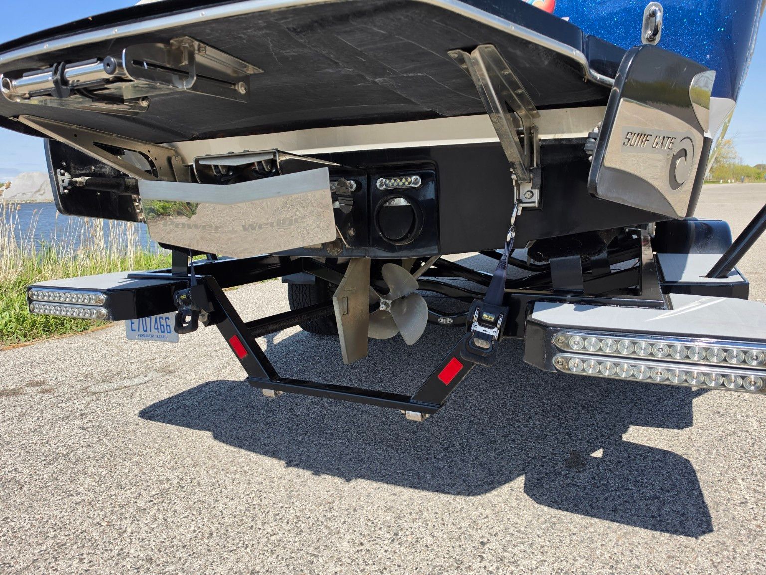 Rear view of a 2014 Malibu Wakesetter 24 MXZ boat.