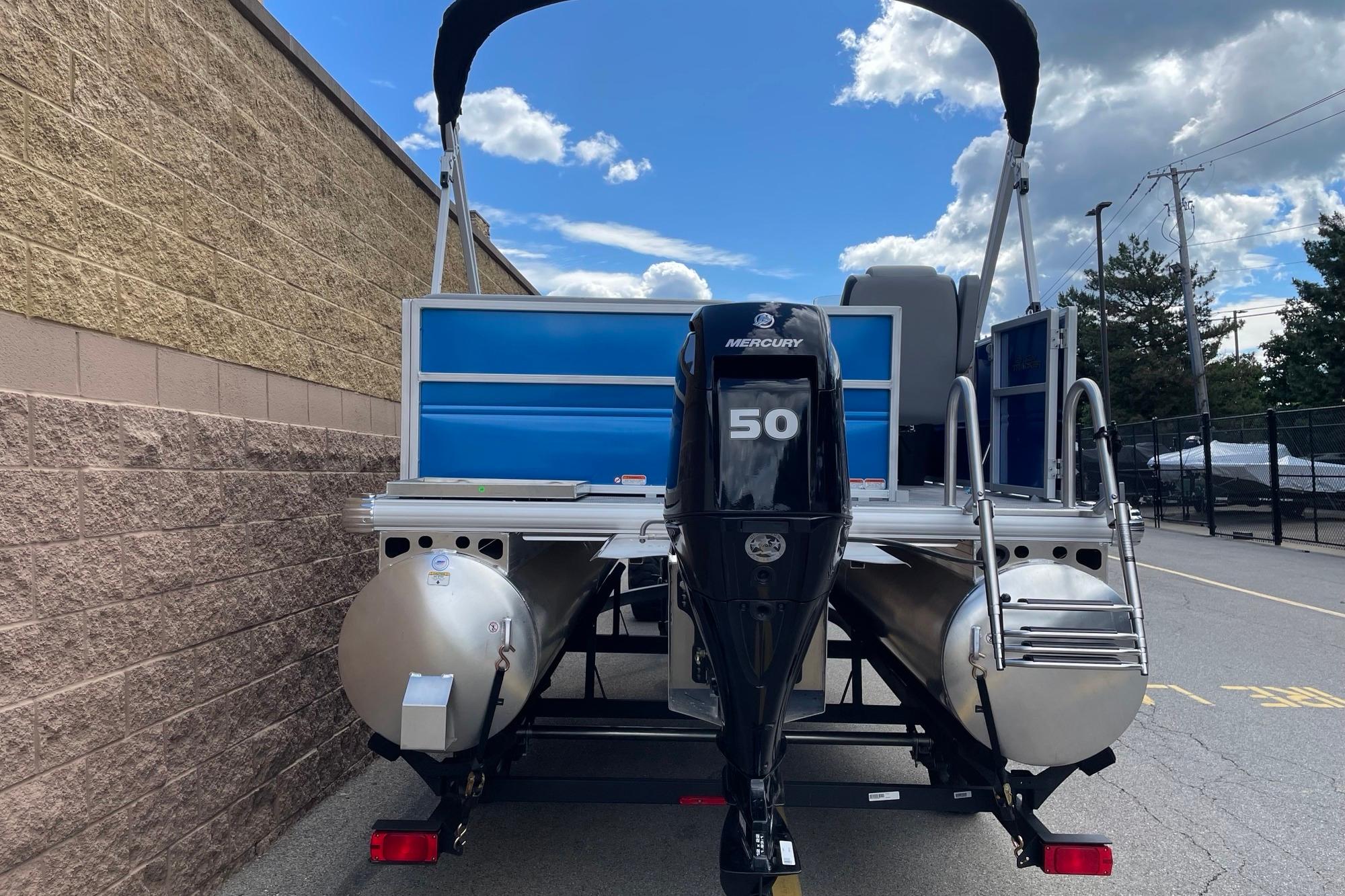 2026 Sun Tracker Party Barge 16 DLX pontoon boat with Mercury 50 engine.