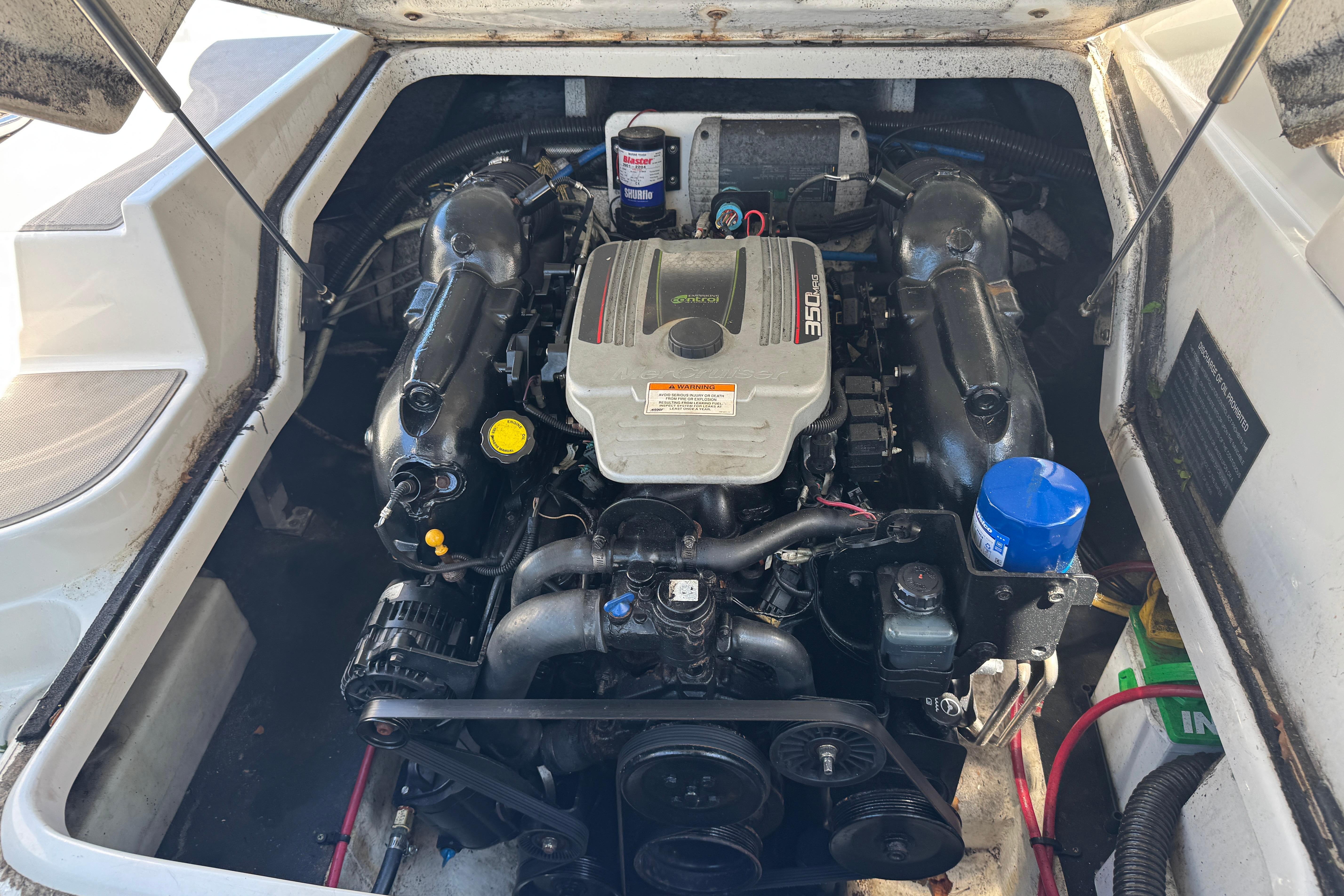 Engine compartment of a 2013 Crownline Eclipse E6 XS boat, featuring a 350 MAG engine.