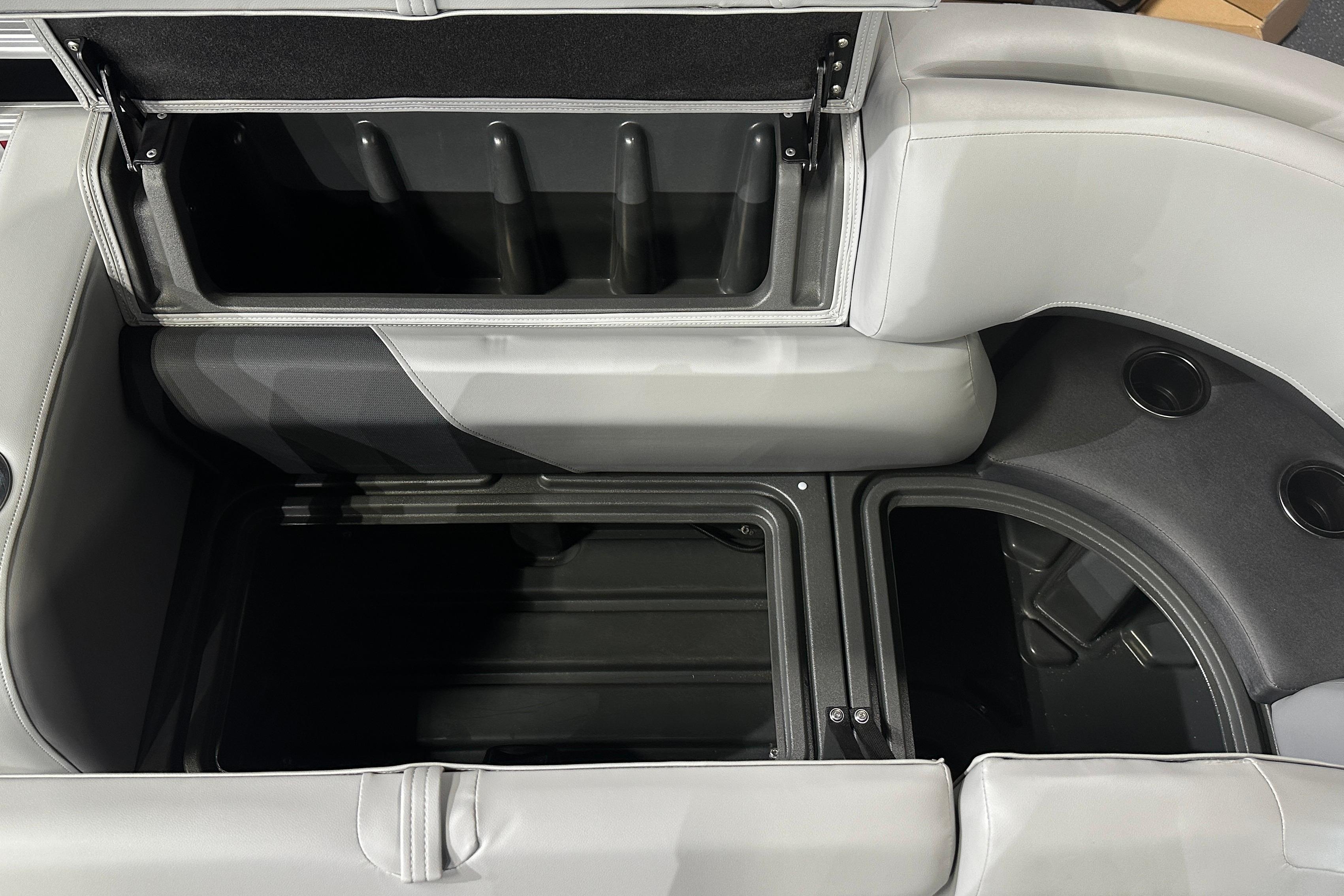 Interior storage compartments of 2026 Sun Tracker SportFish 22 DLX boat.