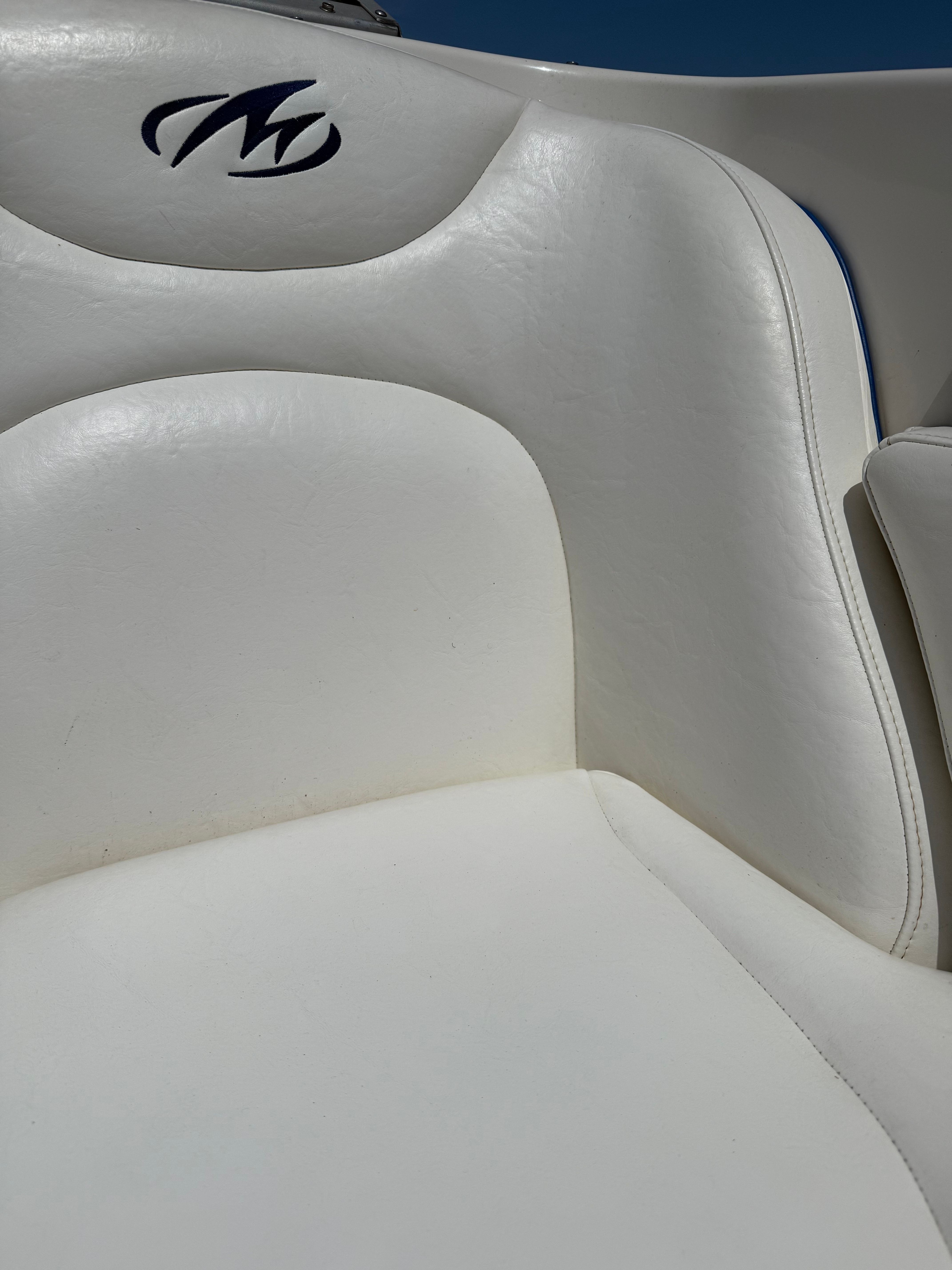 Close-up of a white boat seat with Monterey logo.