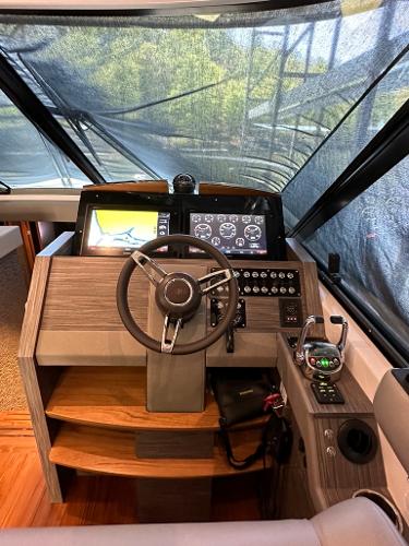 2019 Tiara Yachts C53 helm station with advanced navigation controls.