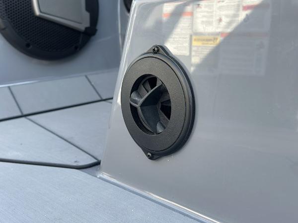 Close-up of a speaker on a 2025 Axis A225 boat interior.