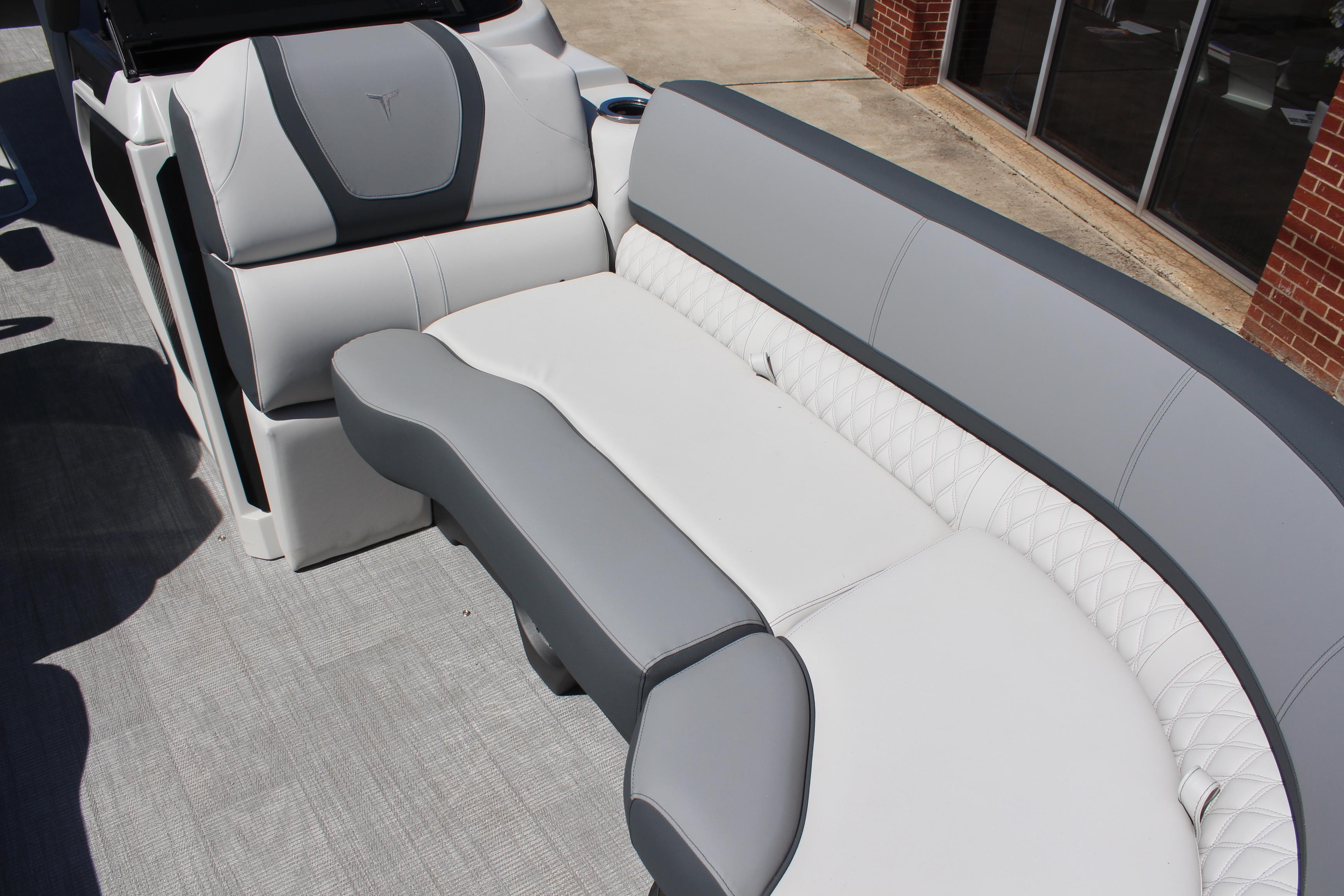 2025 Tahoe Pontoon Cascade Quad Lounge Windshield interior with luxurious gray and white seating.