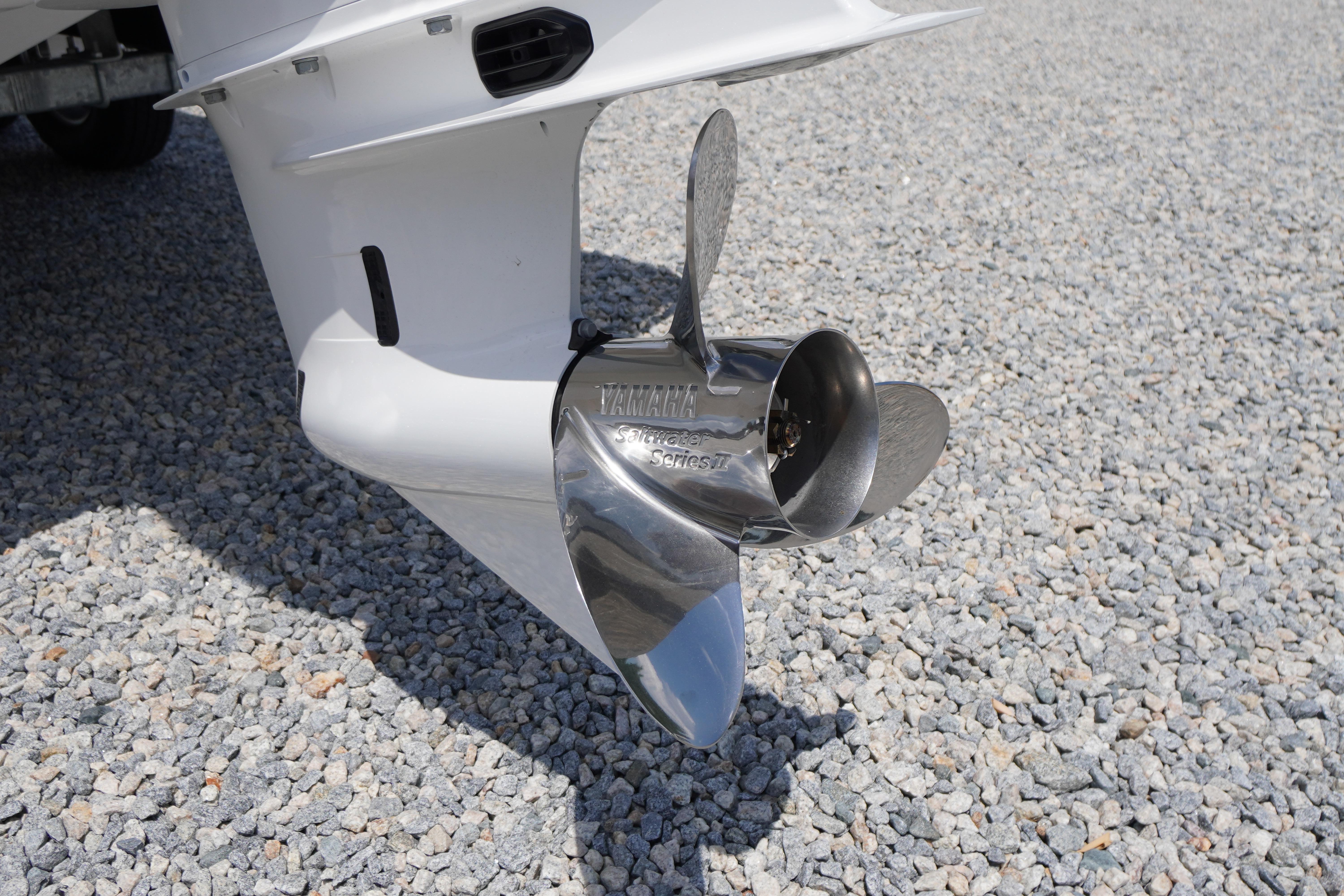 2026 Chaparral SSX 4 boat propeller on gravel surface.