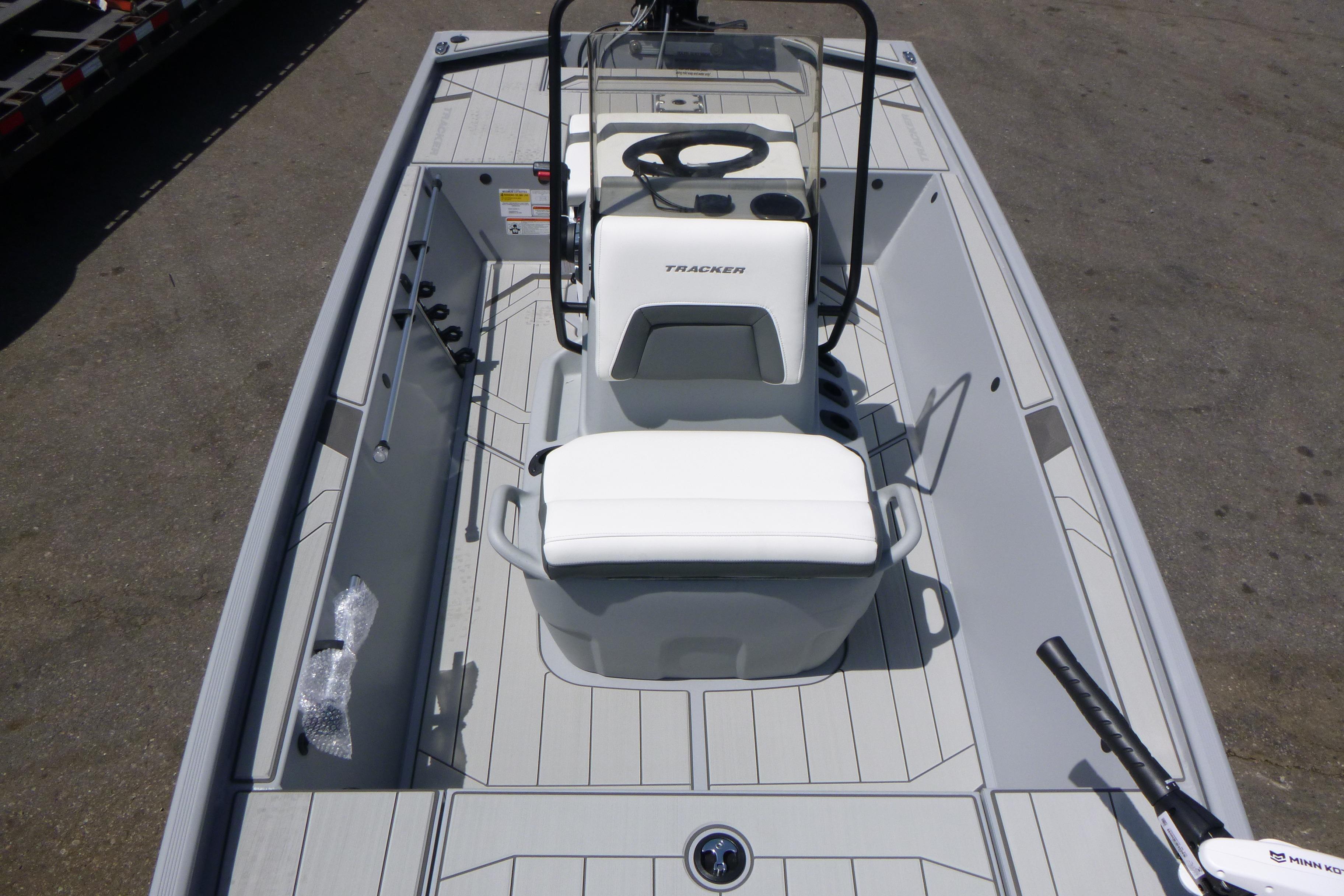 2026 Tracker Bass Tracker Classic CC boat interior with steering console and seating.