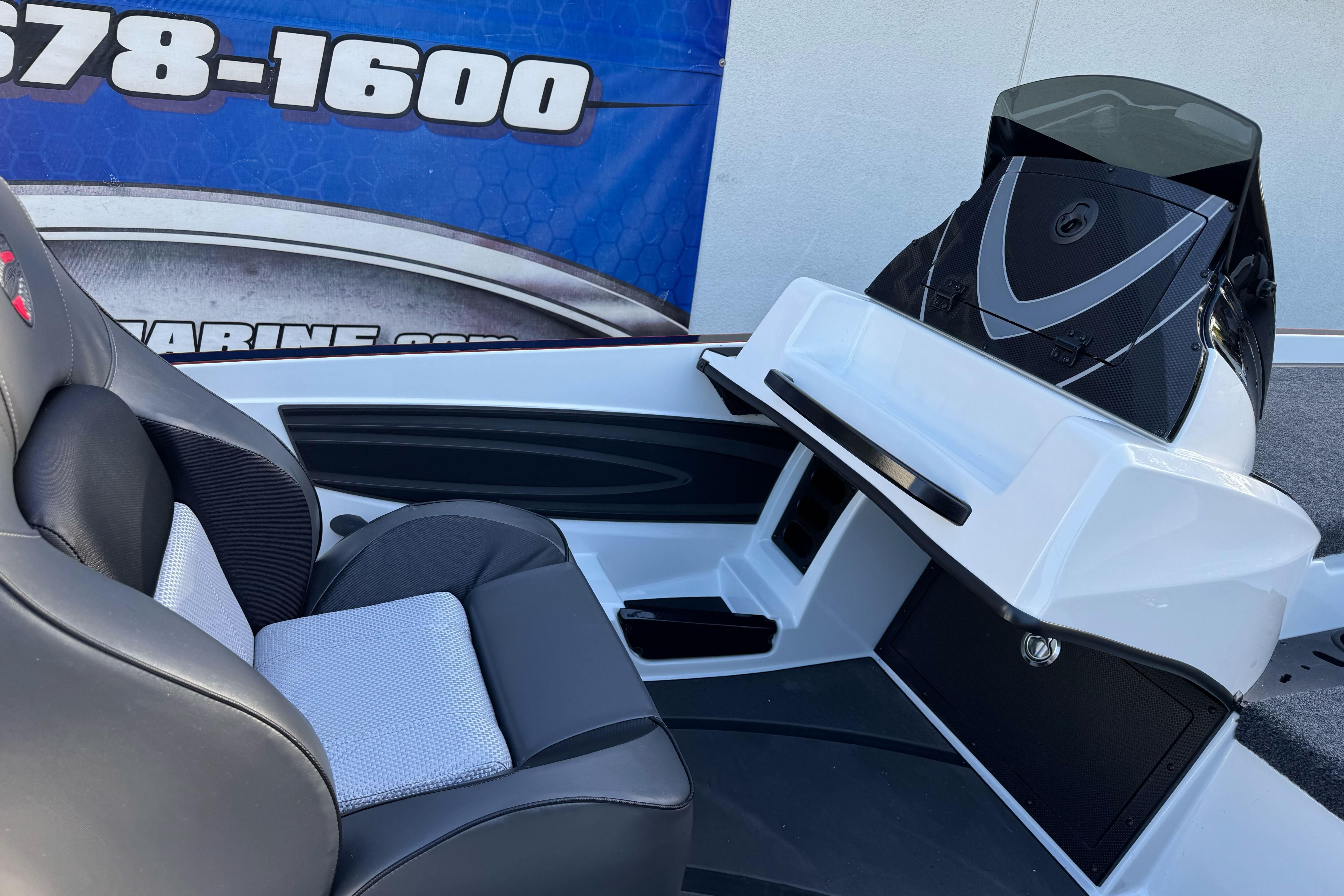 2026 Triton 20XP Patriot boat interior with sleek seating and modern dashboard design.