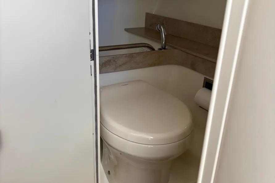 2015 Formula 350 Crossover Bowrider bathroom with toilet and sink.