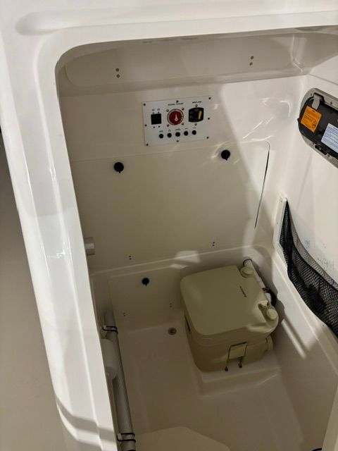 Interior of 2022 Pursuit C 238 Center Console with controls and storage.