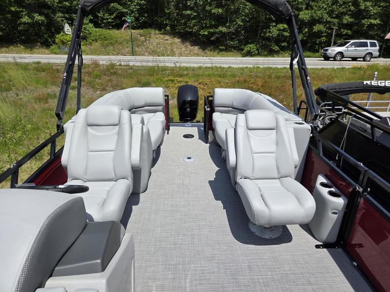 2025 Regency 230 DL3 pontoon boat with spacious seating and modern design.