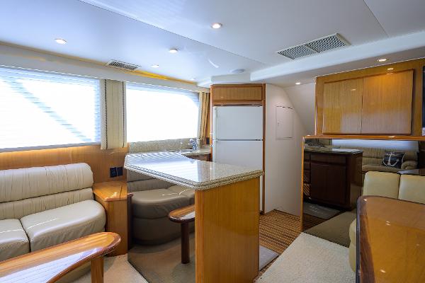 Luxurious interior of a 2000 Viking 50 Convertible yacht with modern furnishings.