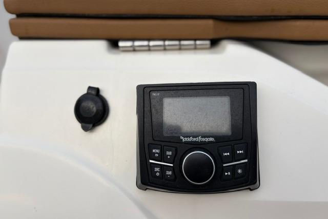 Rockford Fosgate audio control panel on 2017 Searay SPX210 boat dashboard.