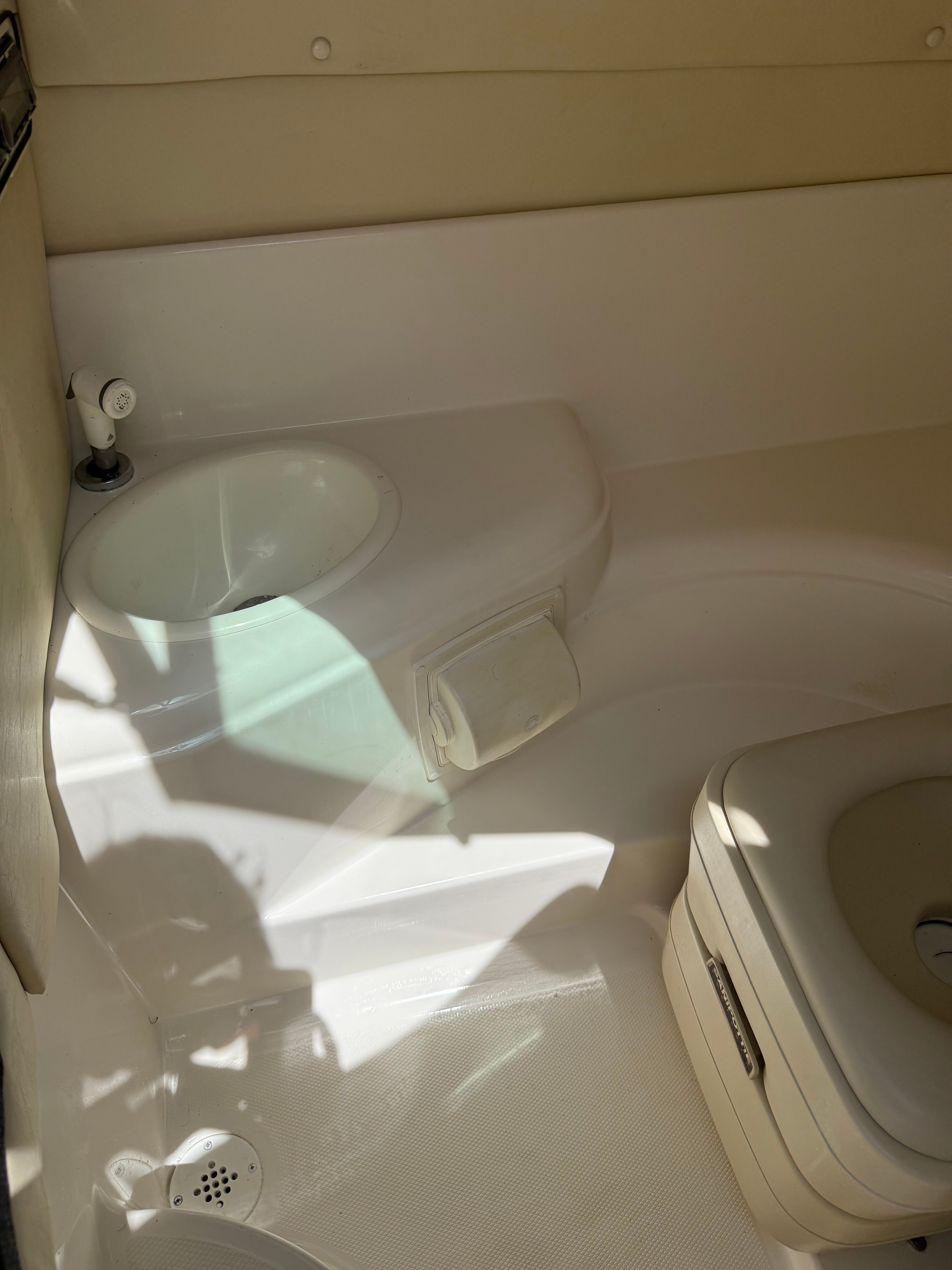 Interior of a 2005 Monterey 223 Explorer Sport with a sink and toilet.