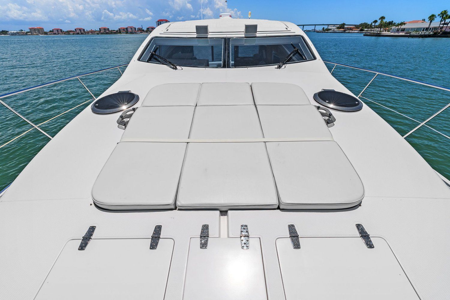A 2018 Mym/Mares 47 Outboard Express Catamaran on the water with a spacious sun deck.
