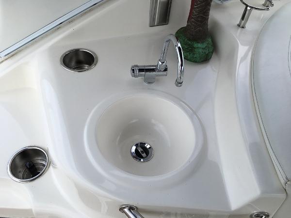 Cruisers Yachts 3372 Express 2004 kitchen area with sink.