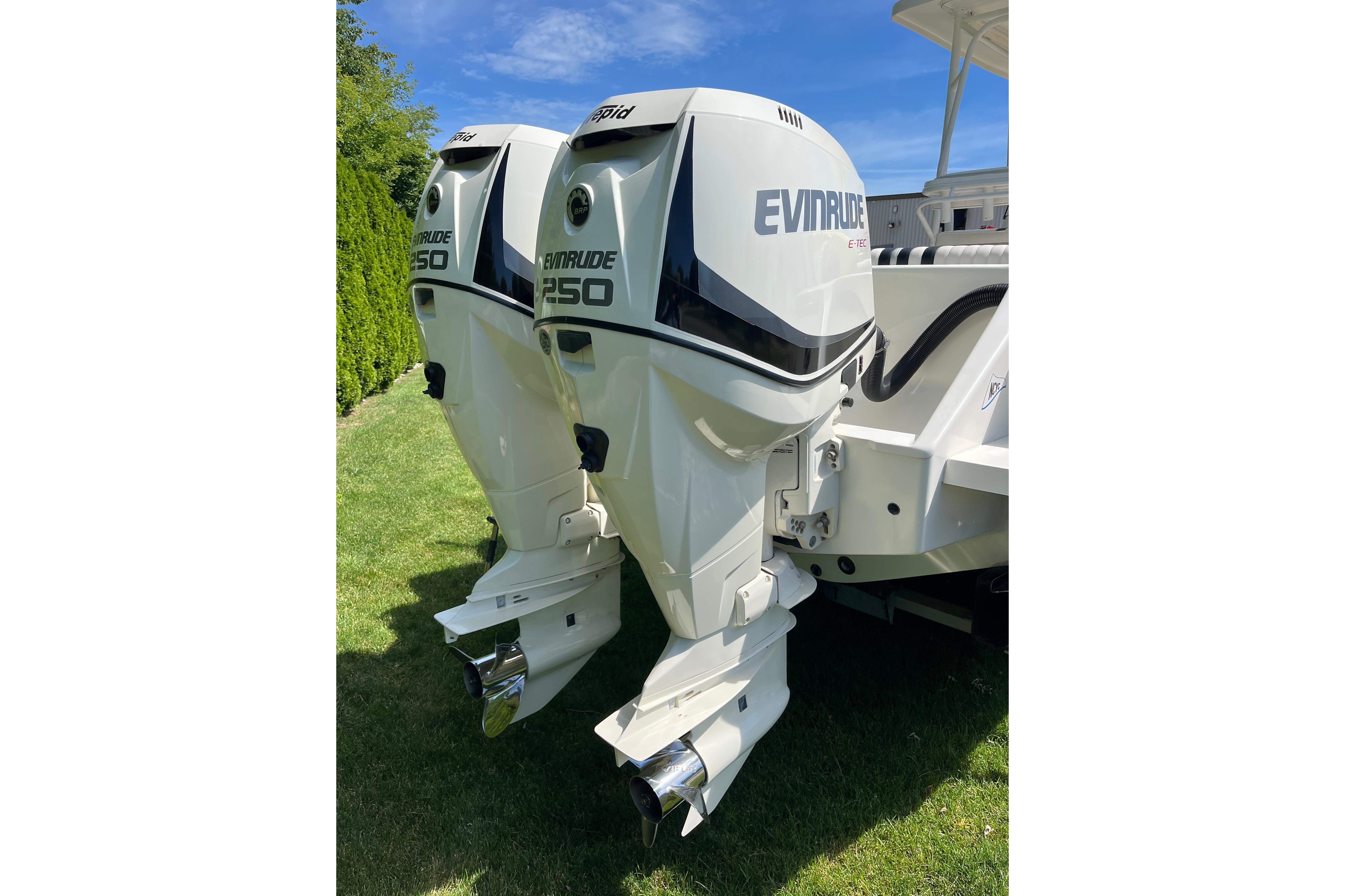 Twin Evinrude 250 outboard engines on a 1994 Intrepid 30 Open Cuddy boat.
