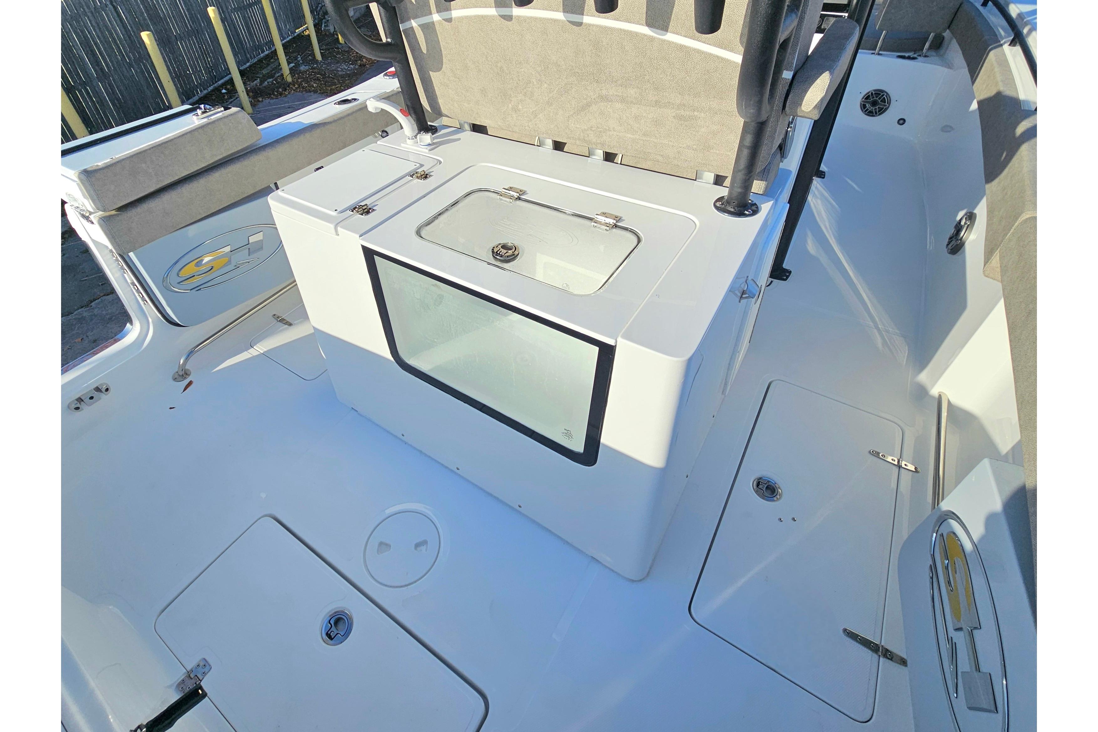 2026 Sea Hunt Ultra 285 SE boat interior with seating and storage compartments.