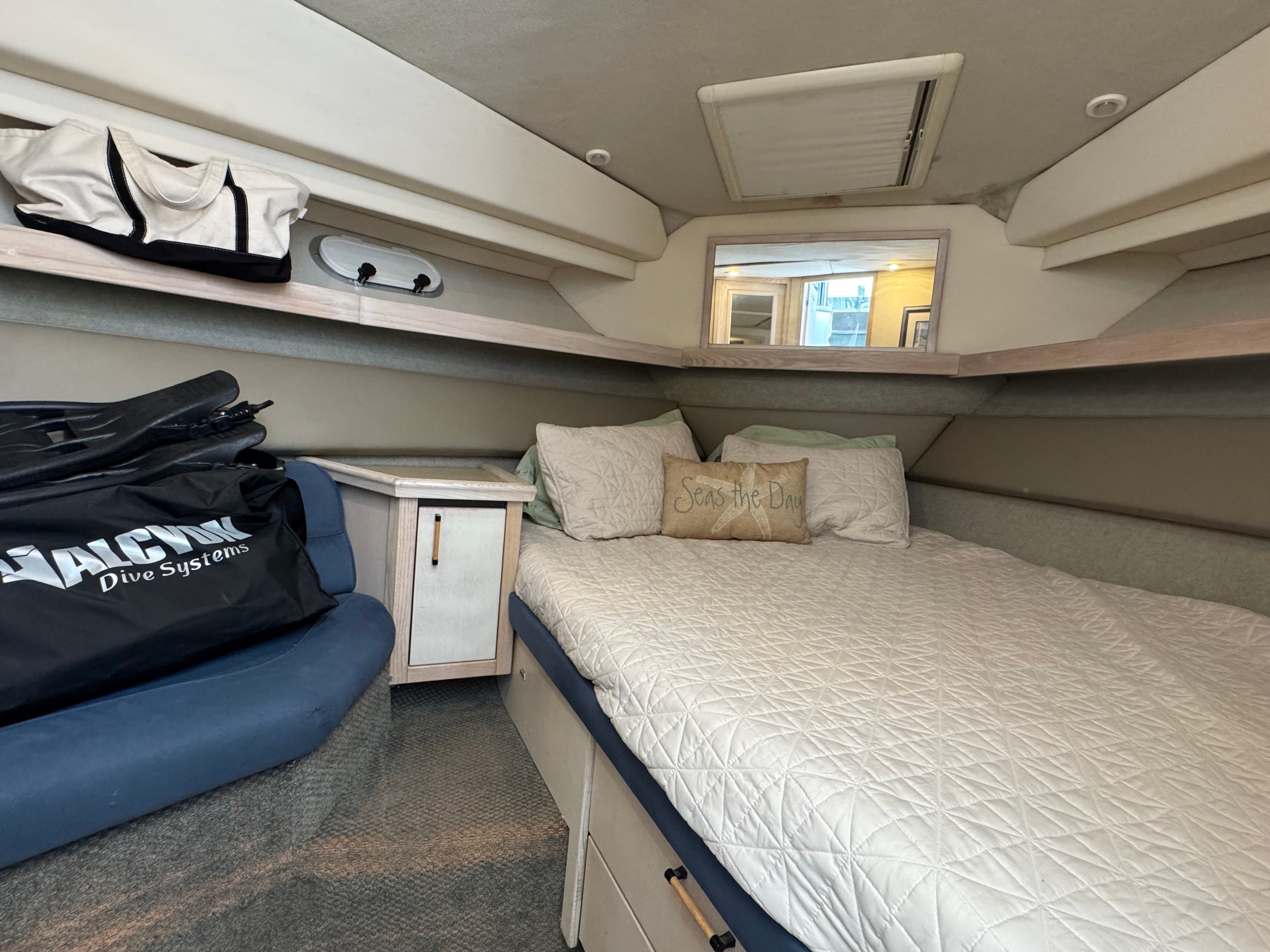 Interior of Bayliner 3587 yacht with cozy bed.