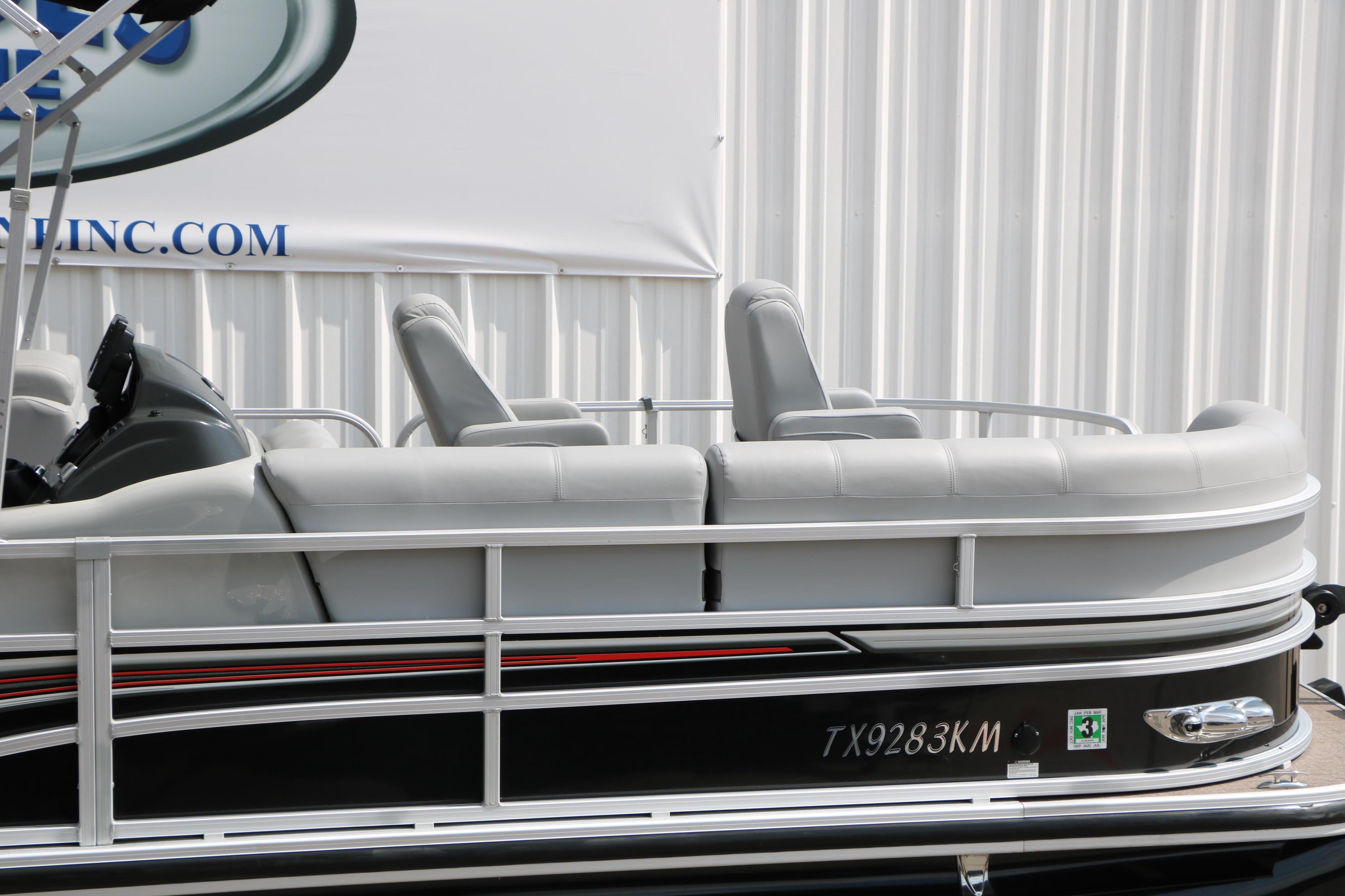 2021 Ranger 223FC pontoon boat with sleek design and comfortable seating.