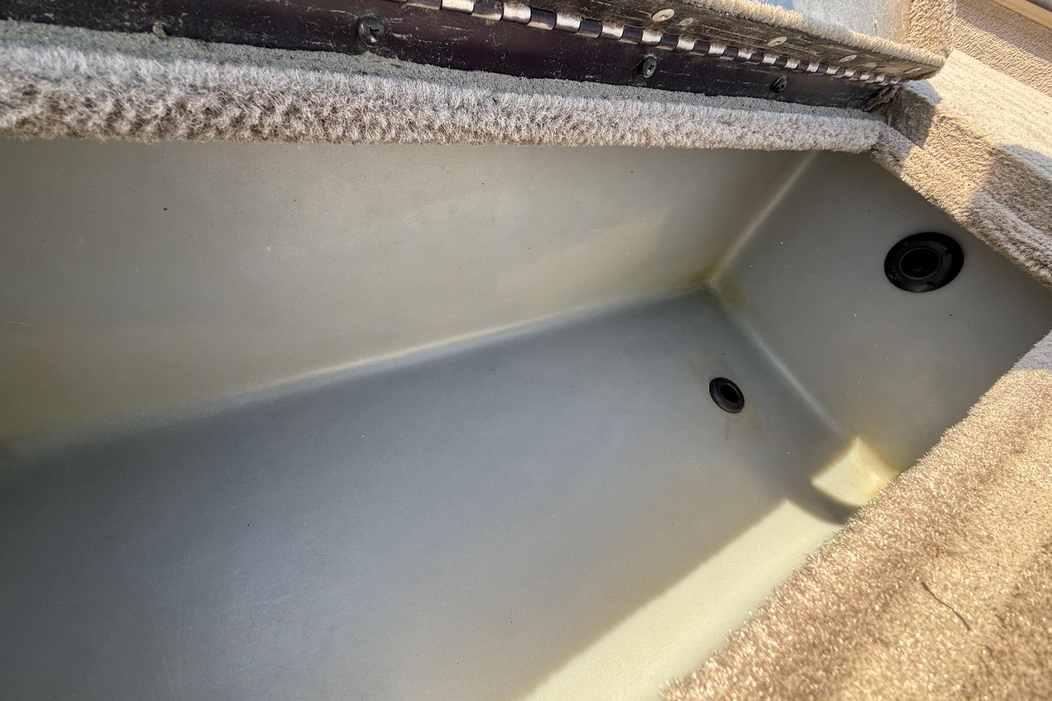 Interior view of a 2010 SeaArk Stealth 190 boat compartment.