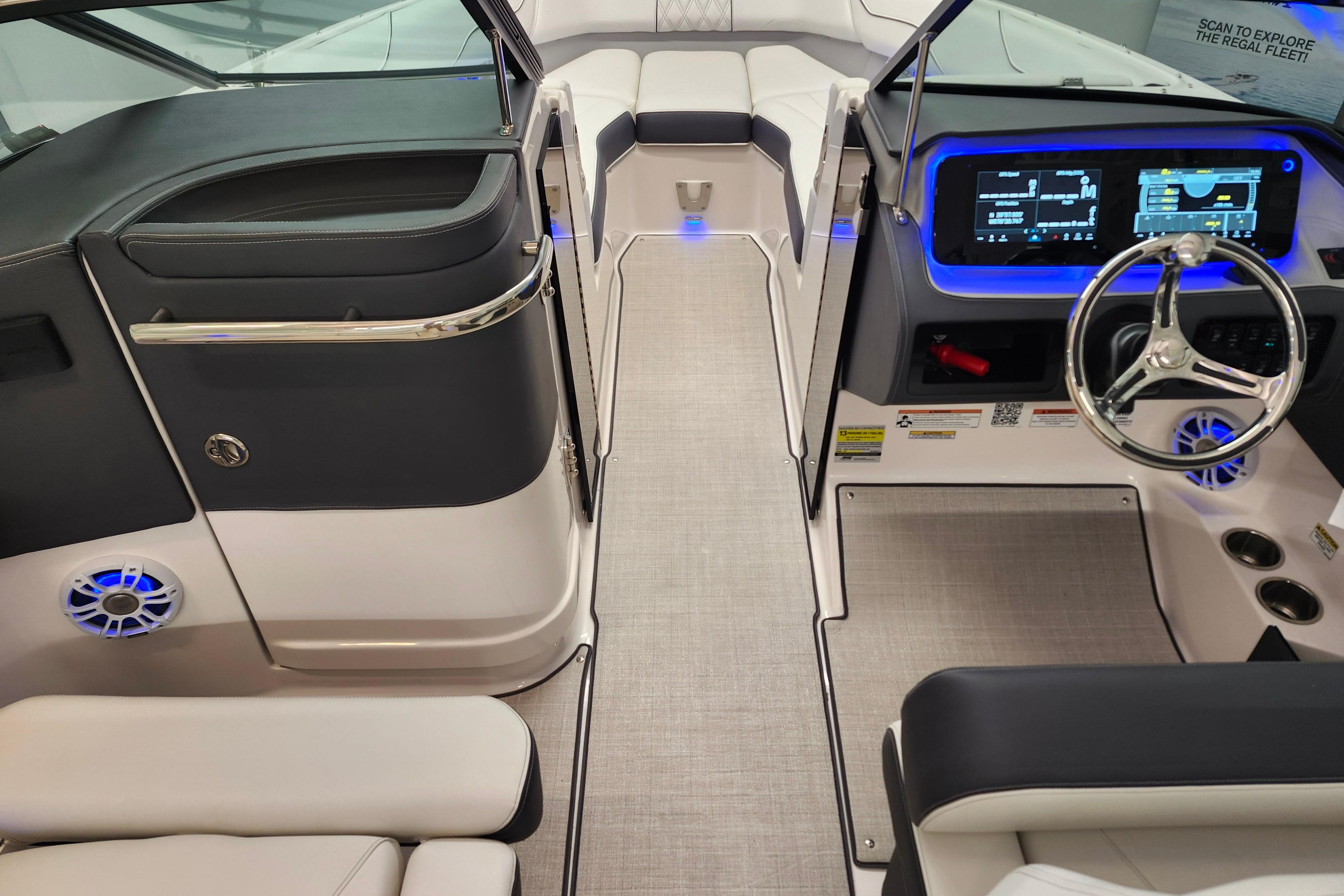 2025 Regal LX4 boat interior with modern dashboard and sleek seating design.