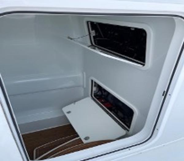 2022 Yellowfin 39 Offshore boat storage compartment with open access panels.