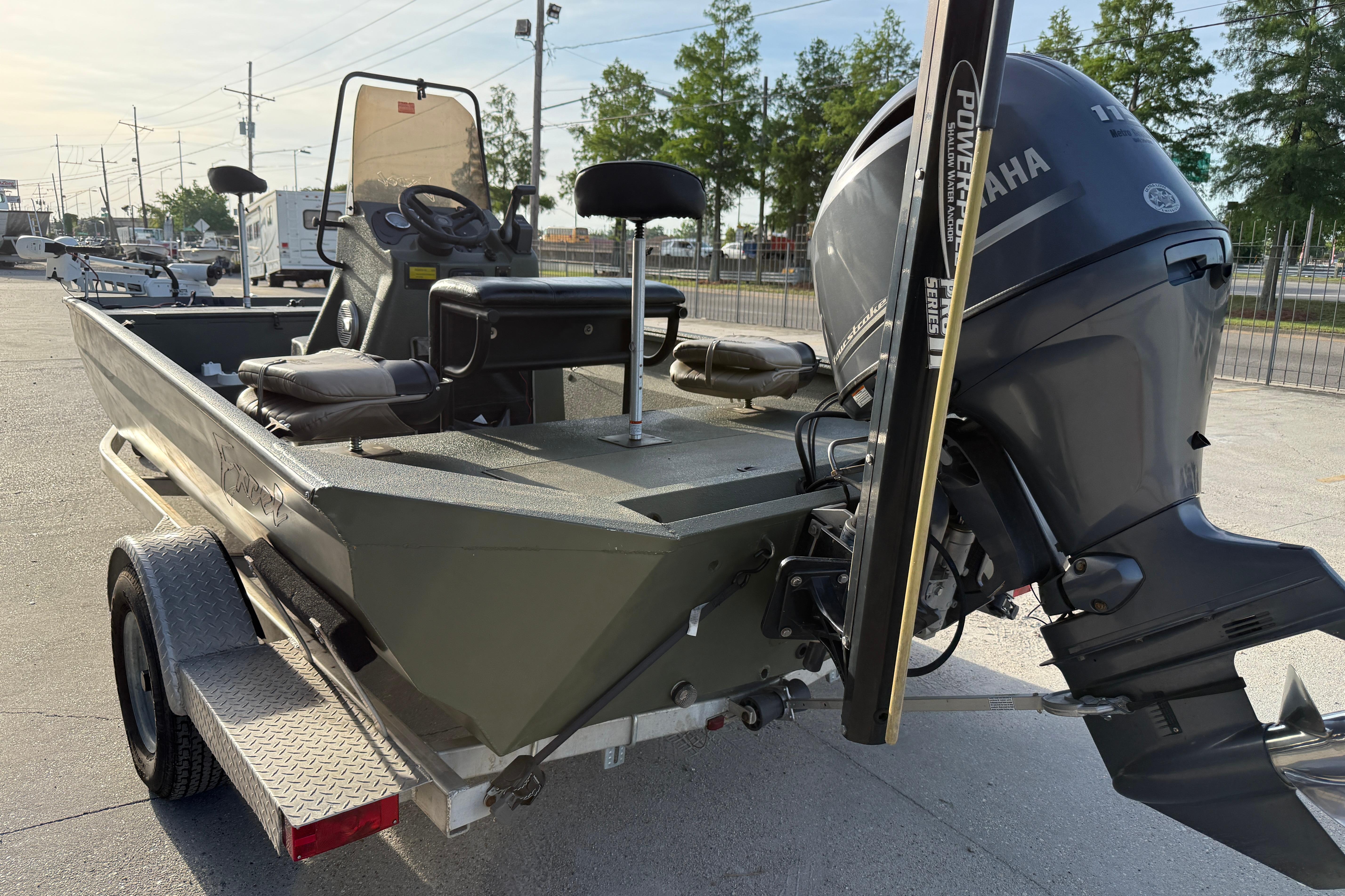 2014 Excel 203 Bay Pro boat with Yamaha outboard motor on trailer.