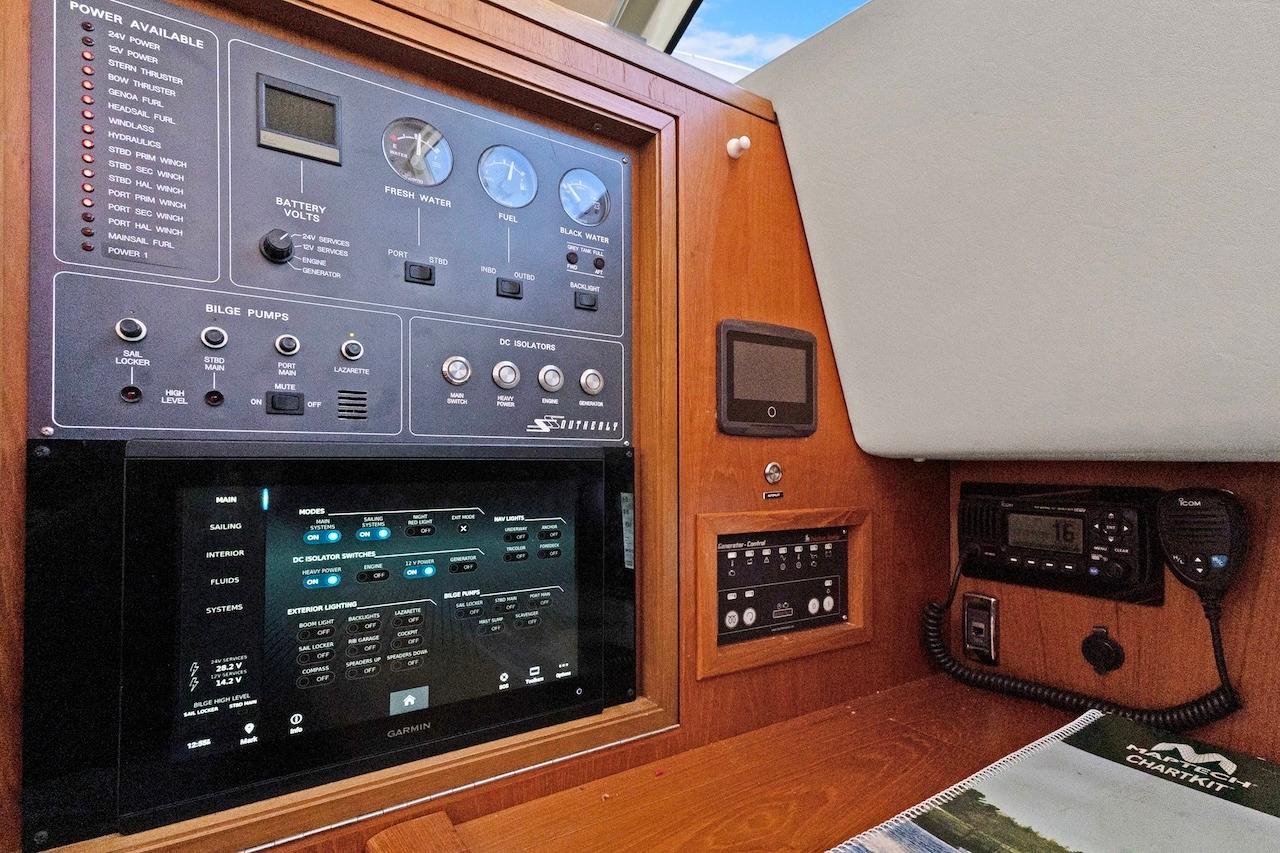 Control panel of a 2011 Southerly 57 RS yacht with navigation and communication equipment.