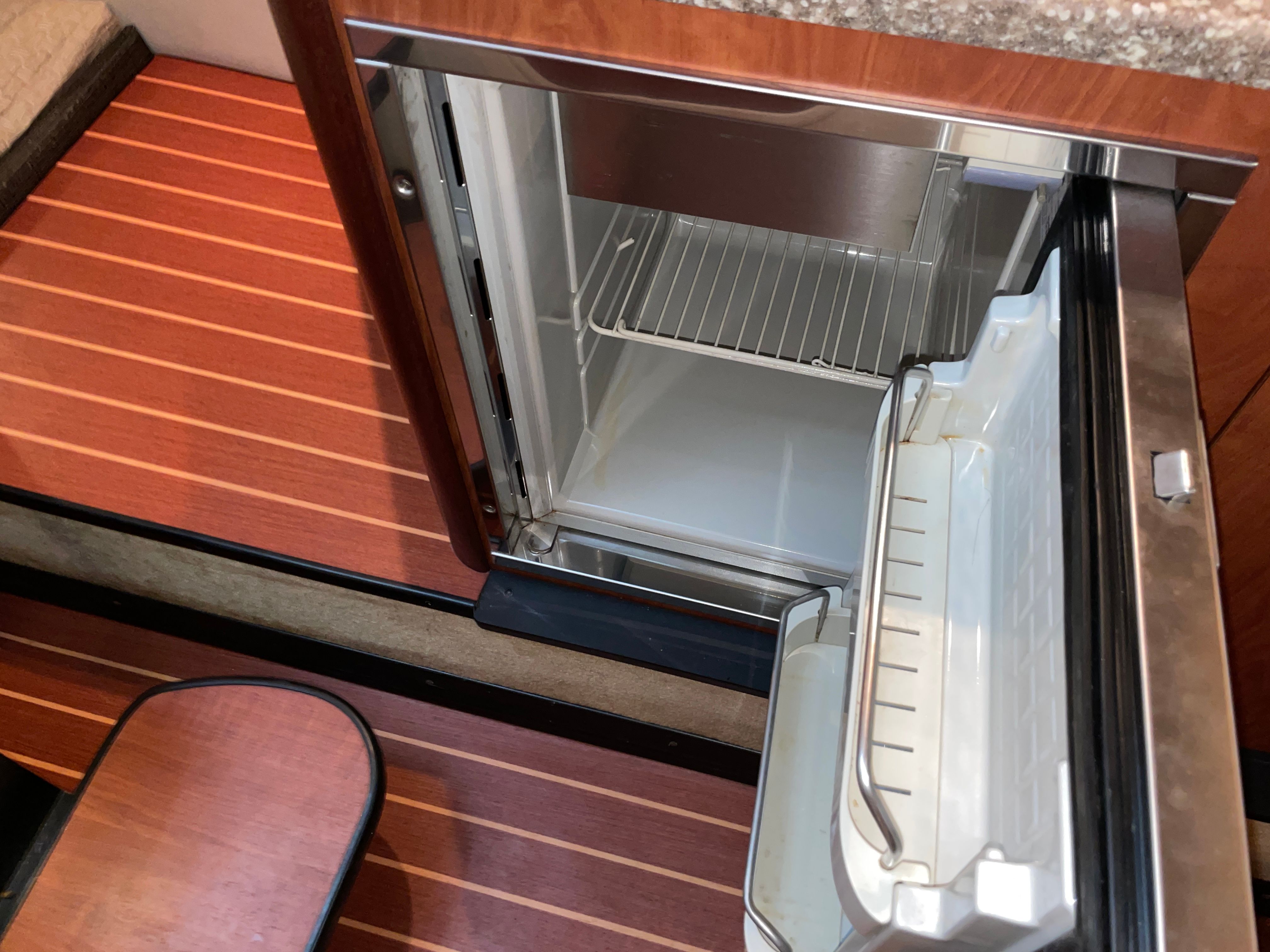 Open refrigerator in 2010 Monterey 280 Sport Cruiser.