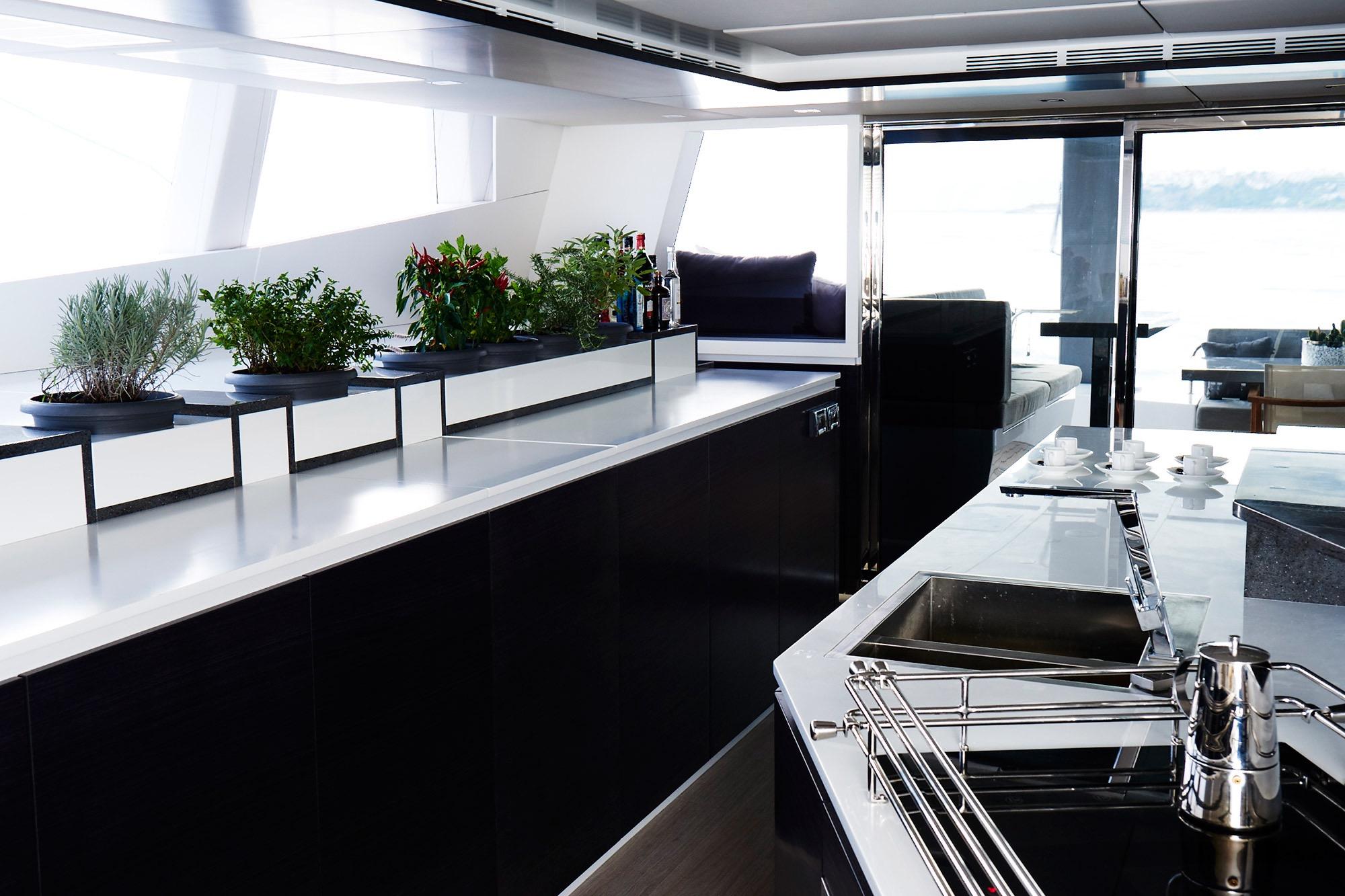 Luxurious Sunreef 74 yacht kitchen interior with modern design and herb garden, 2015 model.