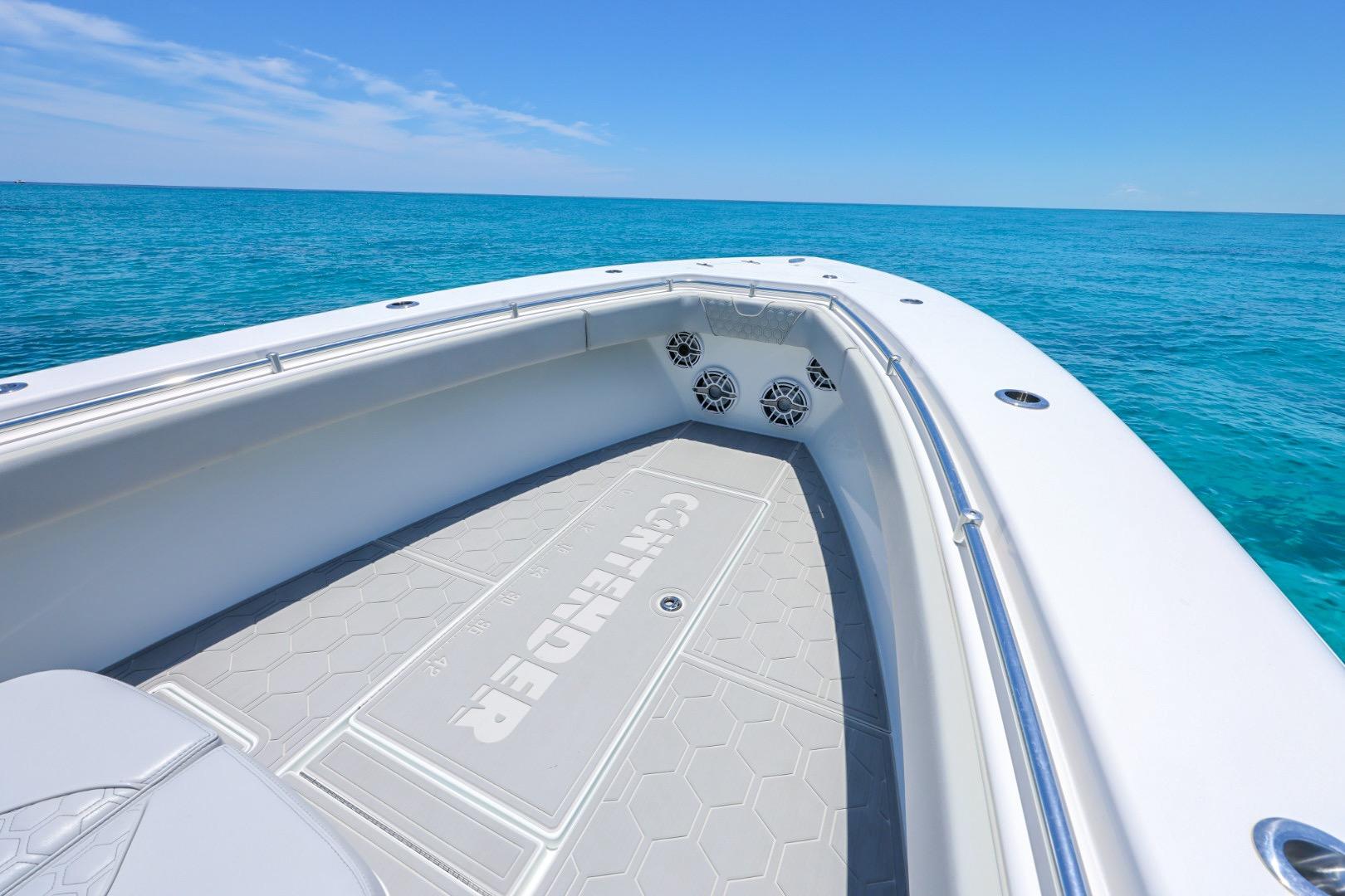 2023 Contender 35 ST boat on clear blue ocean waters.