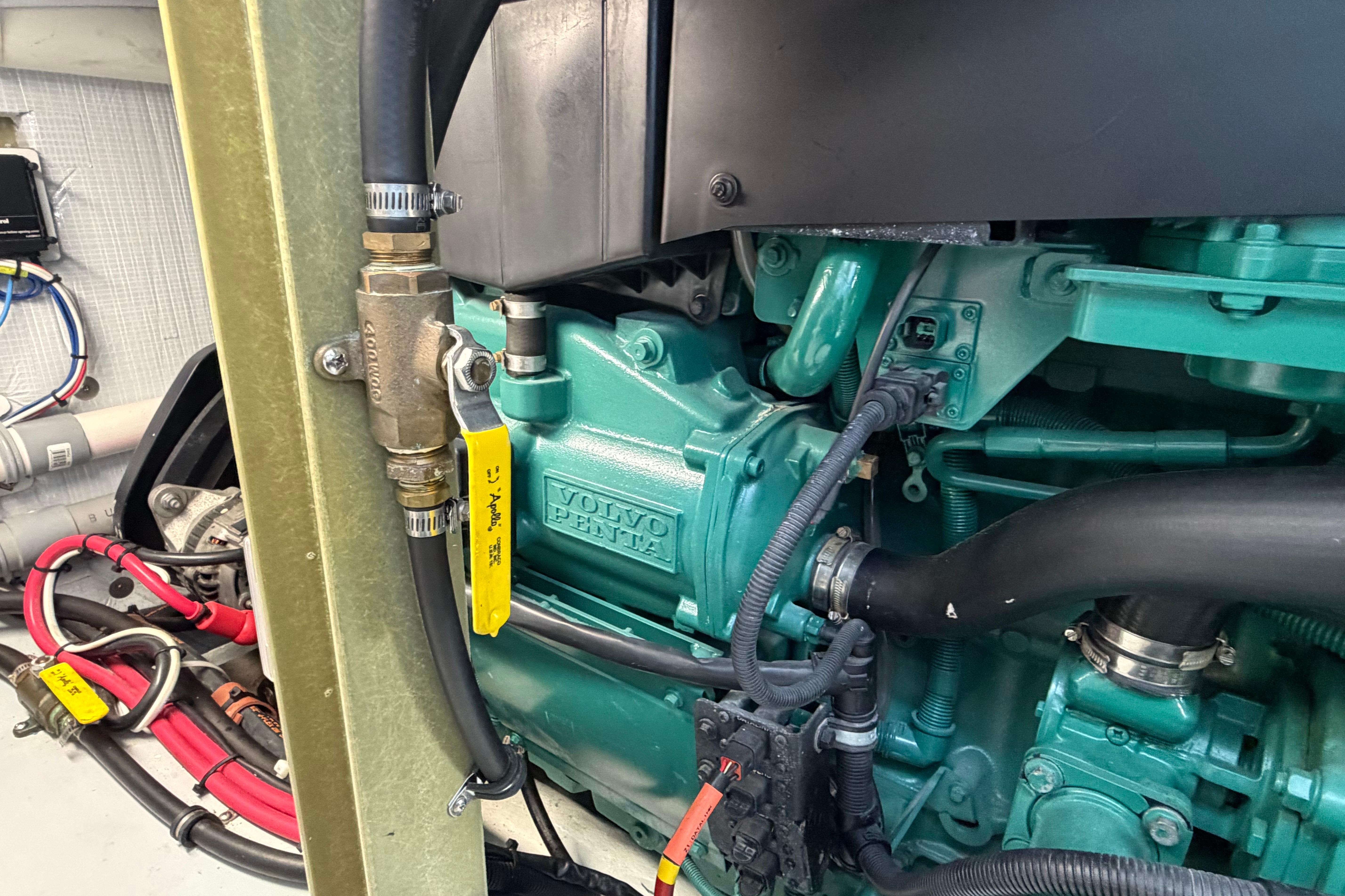 Volvo Penta engine in 2018 H&H Marine Osmond Beal boat, showcasing detailed components.