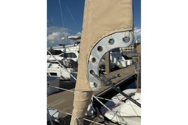 Close-up of a sailboat's rigging detail, Reliance 44, 2011 model, docked at a marina.