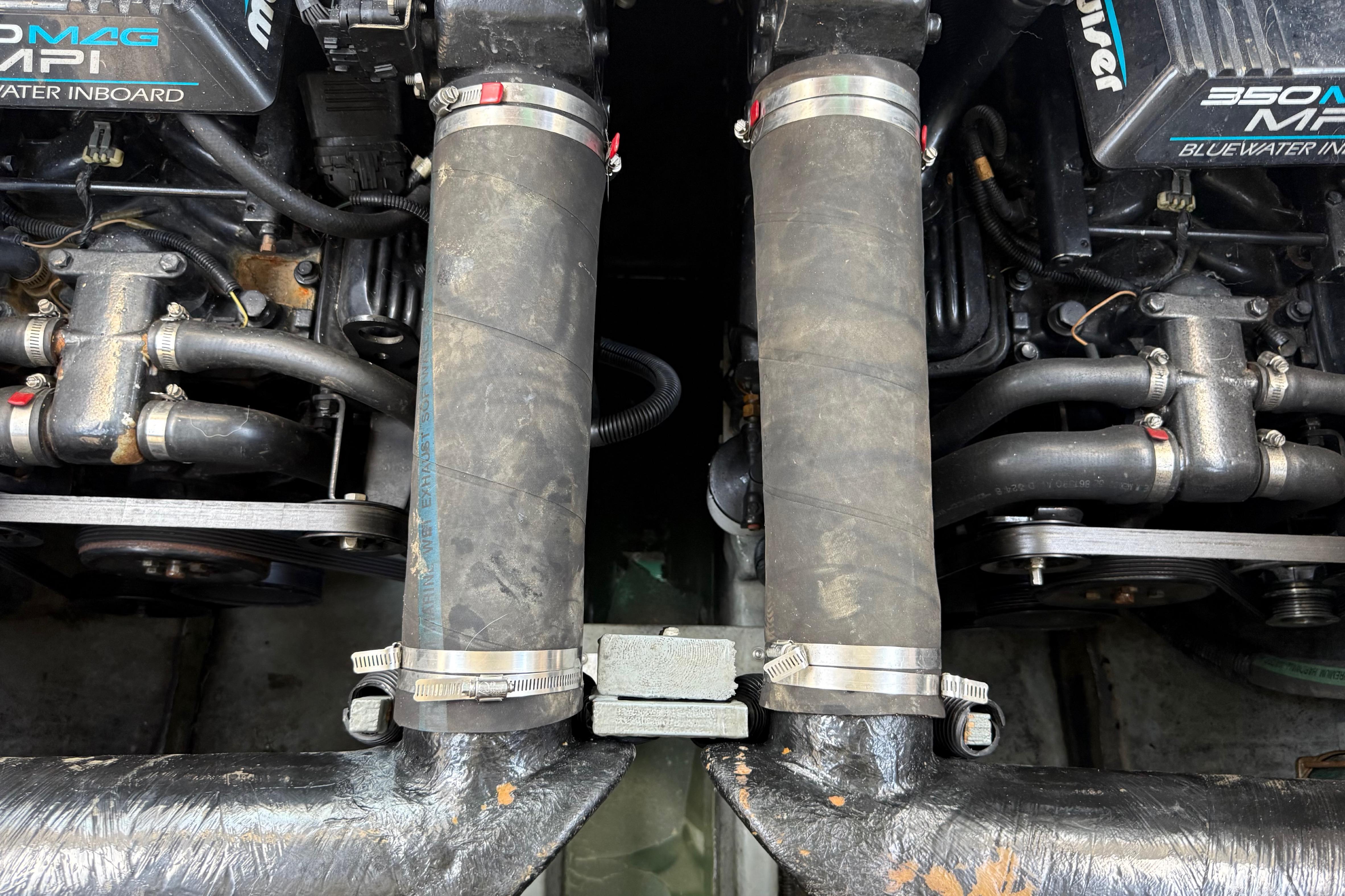 Twin MerCruiser engines in a 1999 Sea Ray Sundancer 310 boat.